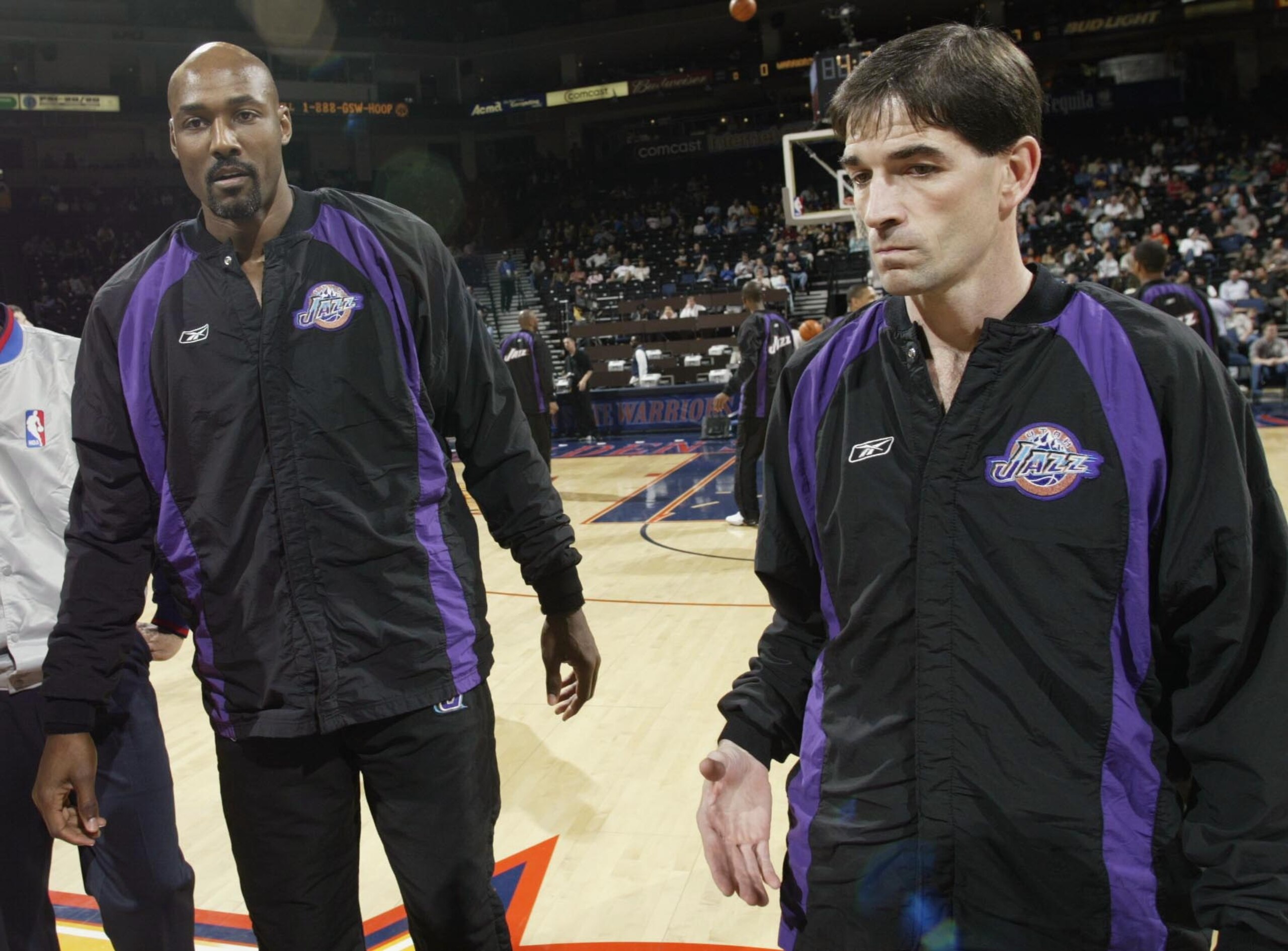 OAKLAND, CA - APRIL 8:  Karl Malone #32 and John Stockton #12 of the Utah Jazz before a game against the Golden State Warriors at the Network Associates Coliseum on April 8, 2003 in Oakland, California. NOTE TO USER: User expressly acknowledges and agrees