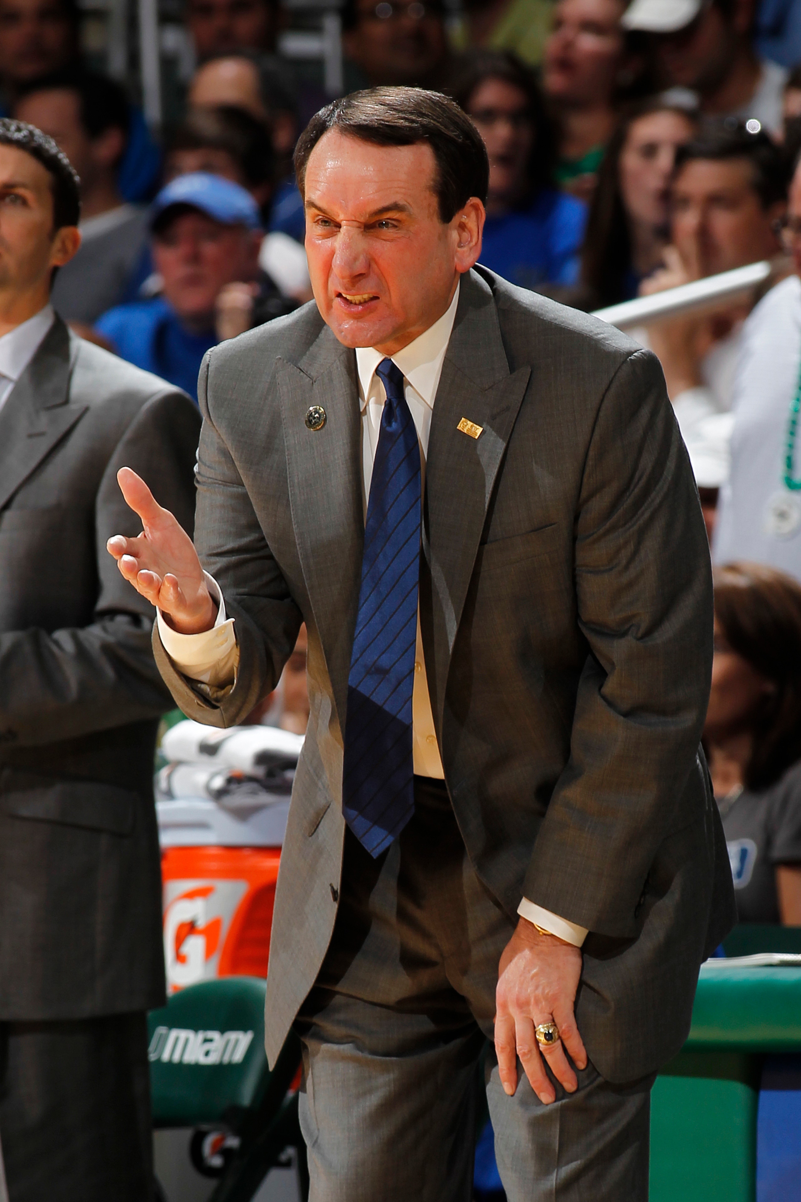 CORAL GABLES, FL - FEBRUARY 13: Head coach Mike Krzyzewski of the Duke Blue Devils reacts to a foul call during first half action against the Miami Hurricanes on February 13, 2011 at the BankUnited Center in Coral Gables, Florida. (Photo by Joel Auerbach/ CORAL GABLES, FL - FEBRUARY 13: Head coach Mike Krzyzewski of the Duke Blue Devils reacts to a foul call during first half action against the Miami Hurricanes on February 13, 2011 at the BankUnited Center in Coral Gables, Florida. (Photo by Joel Auerbach/