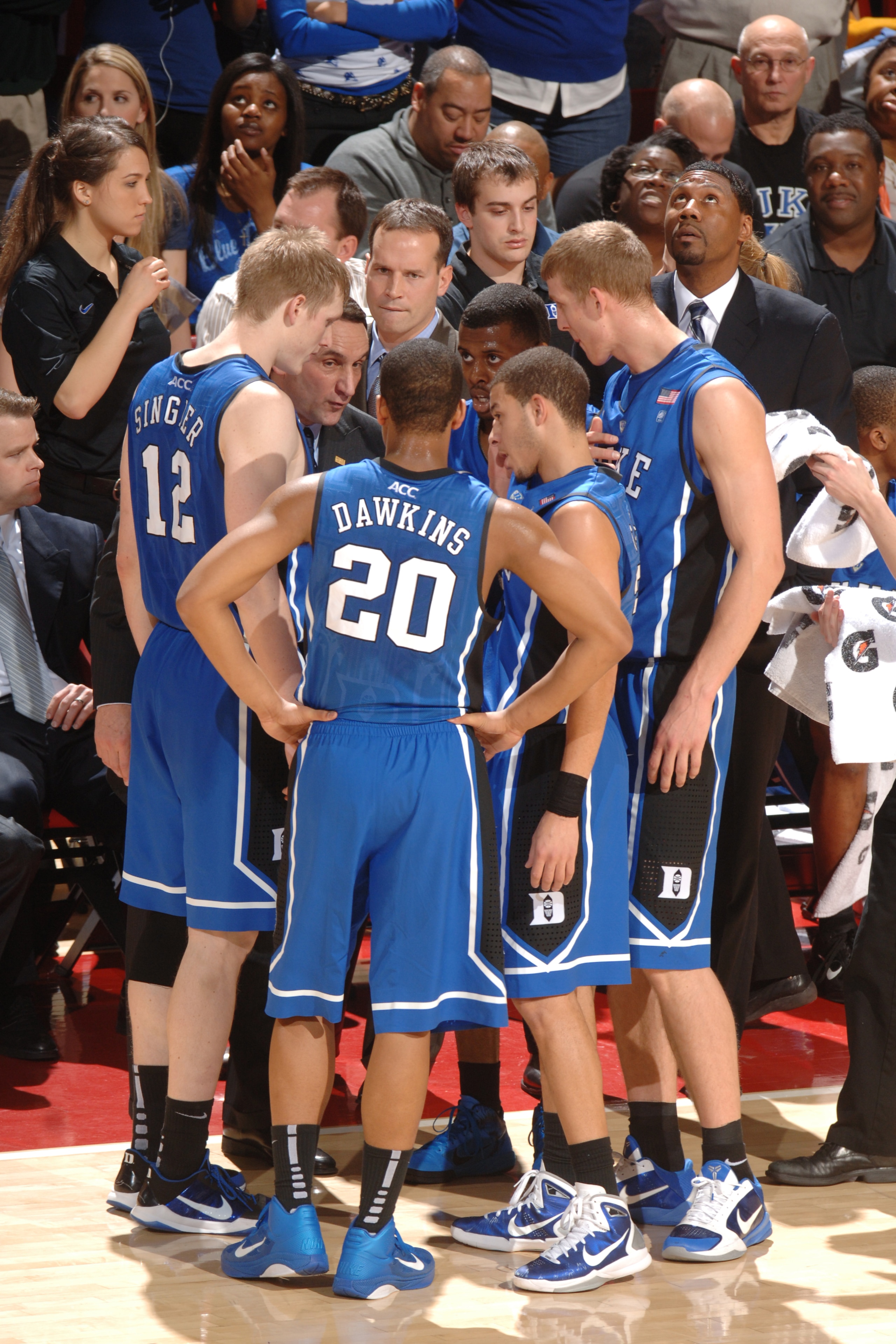 COLLEGE PARK, MD - FEBRUARY 2: Head coach Mike Krzyzewski of the Duke Blue Devils huddles with his players during a college basketball game against the Maryland Terrapins on February 2, 2011 at the Comcast Arena in College Park, Maryland. The Blue Devils COLLEGE PARK, MD - FEBRUARY 2: Head coach Mike Krzyzewski of the Duke Blue Devils huddles with his players during a college basketball game against the Maryland Terrapins on February 2, 2011 at the Comcast Arena in College Park, Maryland. The Blue Devils