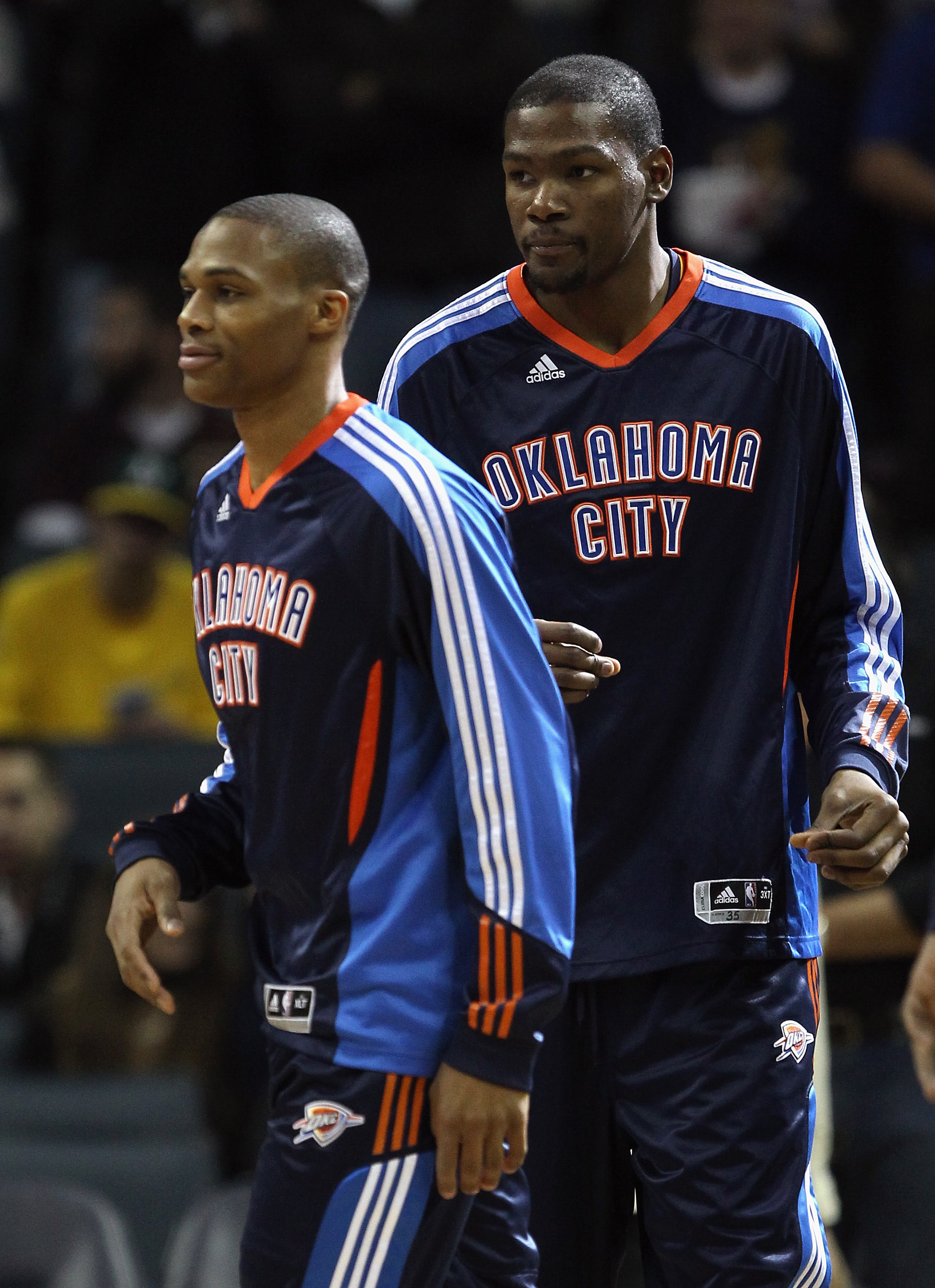 CHARLOTTE, NC - DECEMBER 21:  Teammates Kevin Durant #35 and Russell Westbrook #0 of the Oklahoma Thunder warmup before the start of their game against the Charlotte Bobcats at Time Warner Cable Arena on December 21, 2010 in Charlotte, North Carolina. NOT
