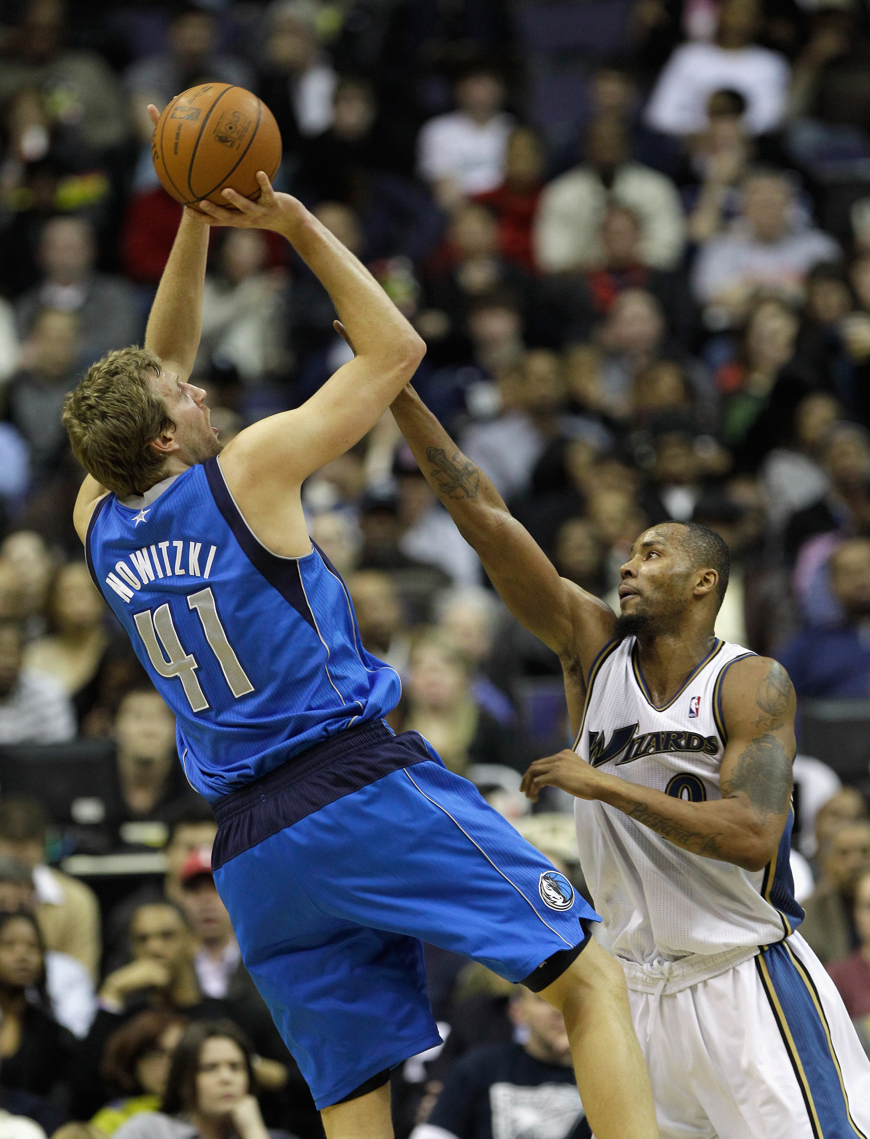 WASHINGTON, DC - FEBRUARY 26: Dirk Nowitzki #41 of the Dallas Mavericks puts up a shot in front of Rashard Lewis #9 of the Washington Wizards at the Verizon Center on February 26, 2011 in Washington, DC. NOTE TO USER: User expressly acknowledges and agree