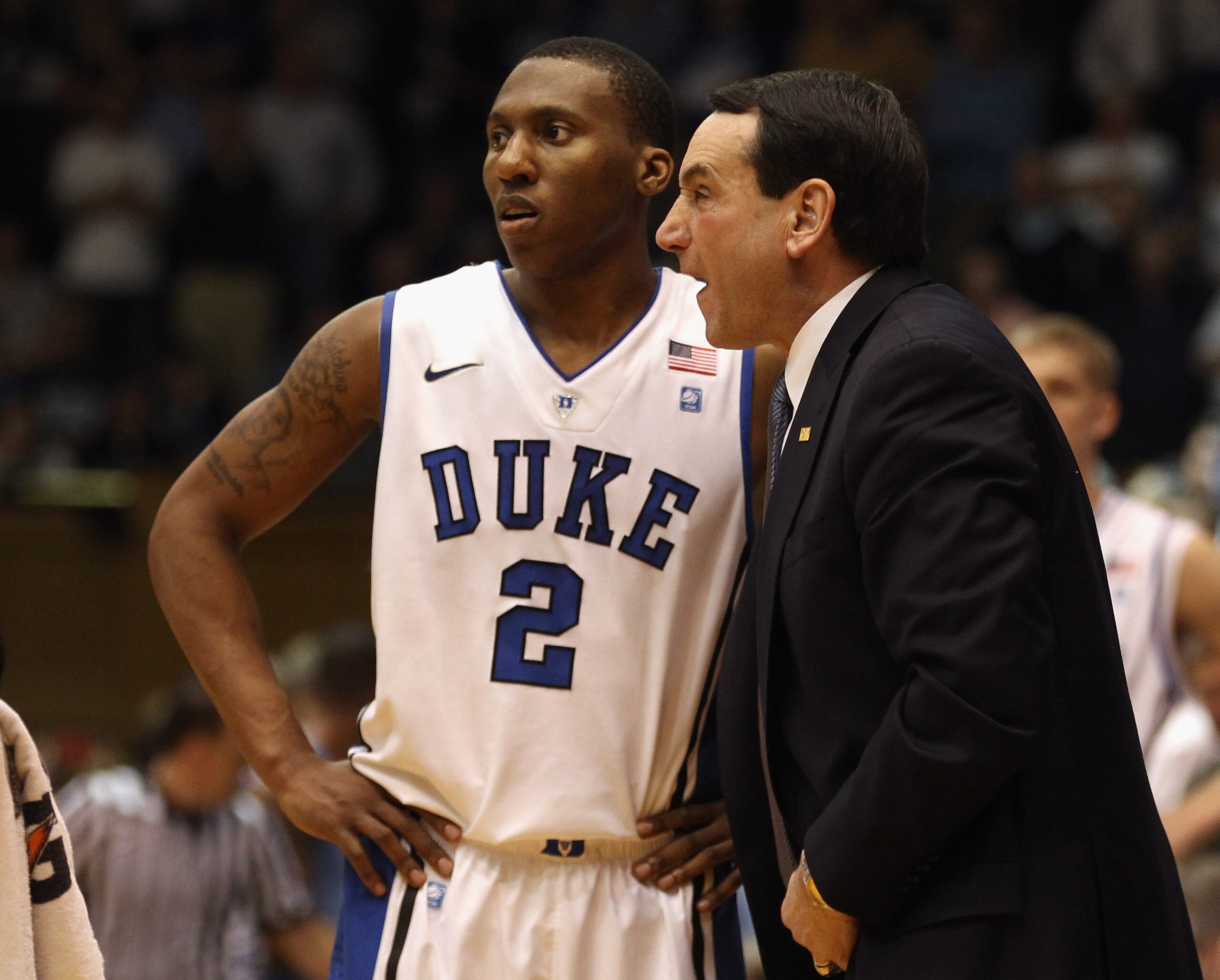 DURHAM, NC - FEBRUARY 09: Head coach Mike Krzyzewski and Nolan Smith #2 of the Duke Blue Devils against the North Carolina Tar Heels during their game at Cameron Indoor Stadium on February 9, 2011 in Durham, North Carolina. (Photo by Streeter Lecka/Gett DURHAM, NC - FEBRUARY 09: Head coach Mike Krzyzewski and Nolan Smith #2 of the Duke Blue Devils against the North Carolina Tar Heels during their game at Cameron Indoor Stadium on February 9, 2011 in Durham, North Carolina. (Photo by Streeter Lecka/Gett