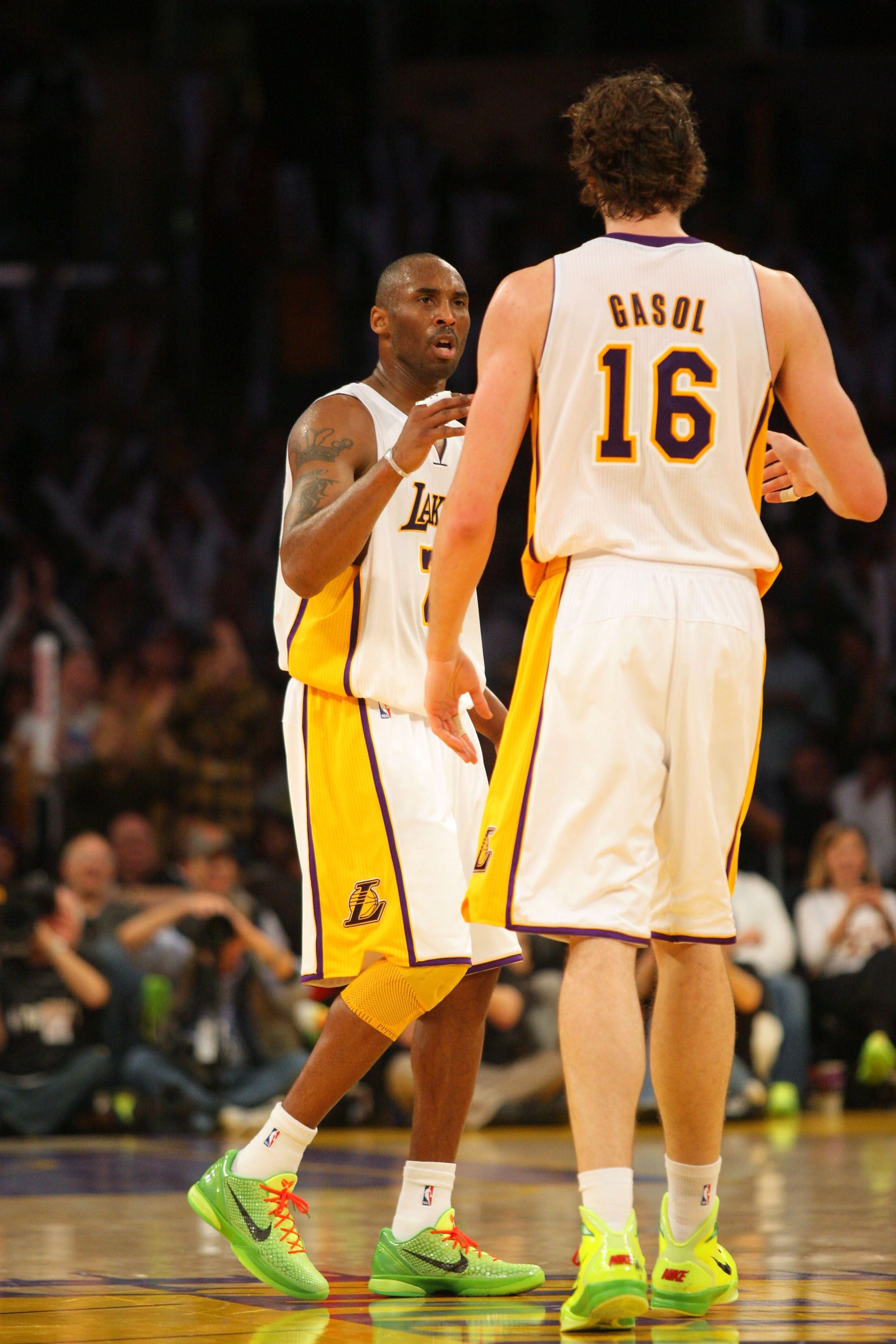 LOS ANGELES, CA - DECEMBER 25:  Kobe Bryant #24 of the Los Angeles Lakers and teammate Pau Gasol #16 celebrate after a play against the Miami Heat during the NBA game at Staples Center on December 25, 2010 in Los Angeles, California. The Heat defeated the