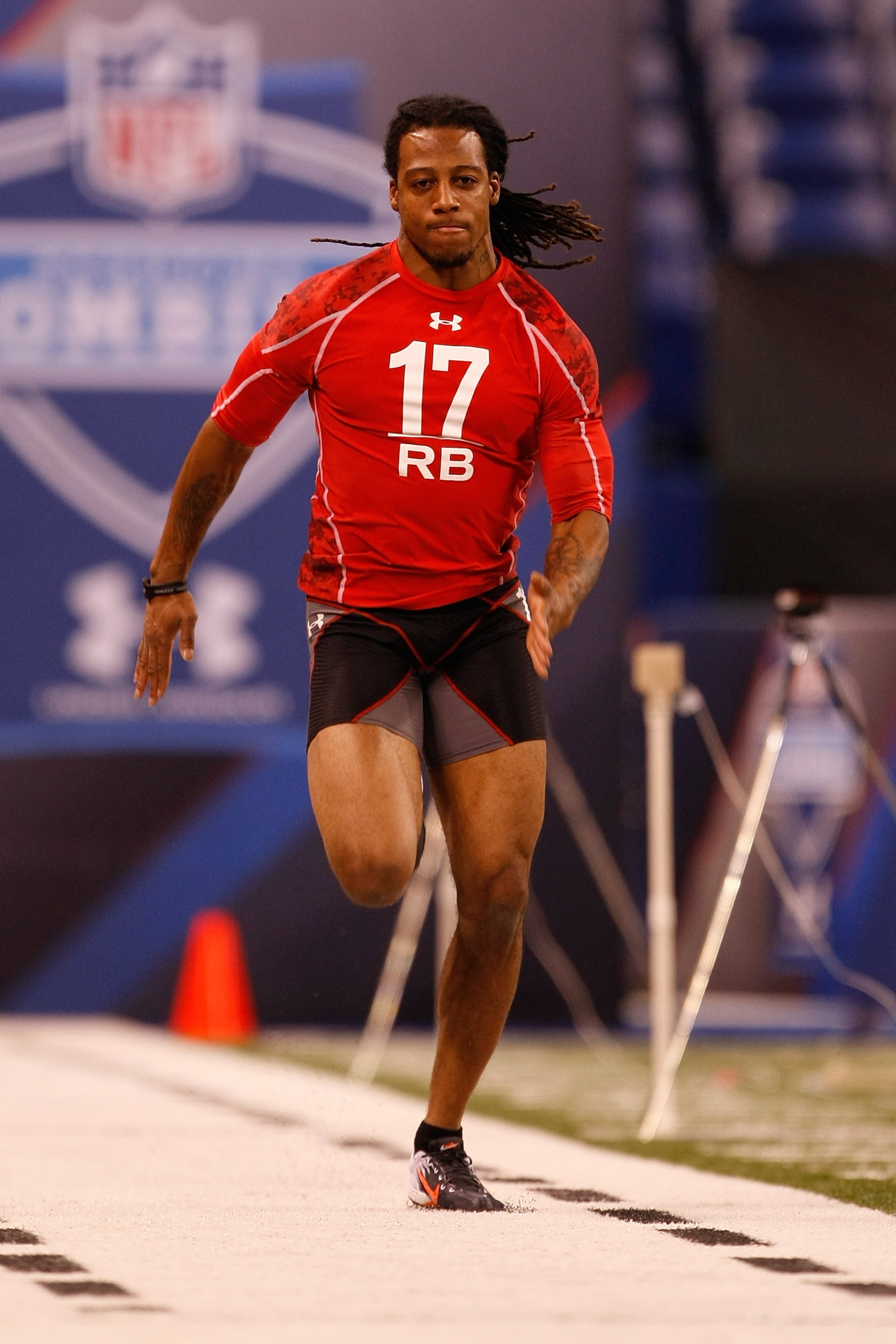 INDIANAPOLIS, IN - FEBRUARY 28: Running back Dexter McCluster of Mississippi runs the 40 yard dash during the NFL Scouting Combine presented by Under Armour at Lucas Oil Stadium on February 28, 2010 in Indianapolis, Indiana. (Photo by Scott Boehm/Getty Im