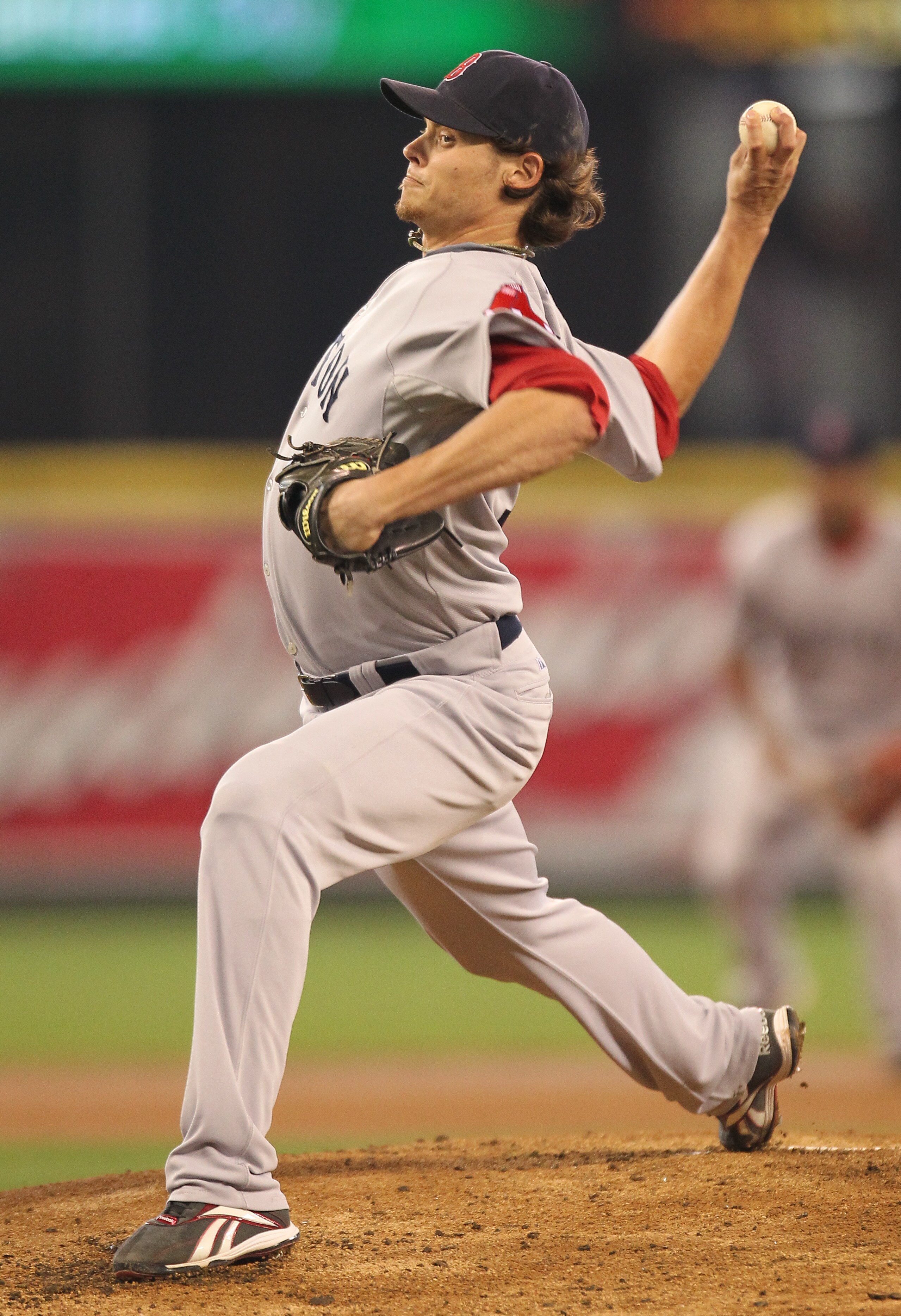 SEATTLE - SEPTEMBER 15:  Starting pitcher Clay Buchholz #11 of the Boston Red Sox pitches against the Seattle Mariners at Safeco Field on September 15, 2010 in Seattle, Washington. (Photo by Otto Greule Jr/Getty Images)