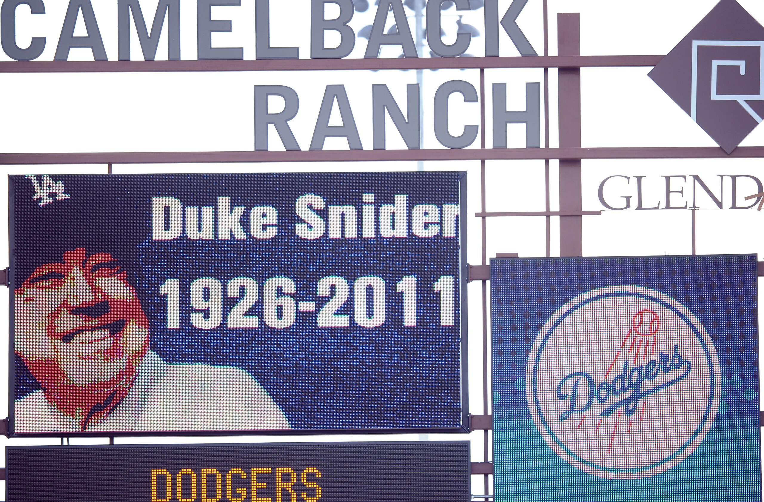 PHOENIX, AZ - FEBRUARY 27:  A picture of Duke Snider is displayed on the stadium scoreboard in honor of his life during the game bewteeen the Los Angeles Angels and the Los Angeles Dodgers during spring training at Camelback Ranch on February 27, 2011 in