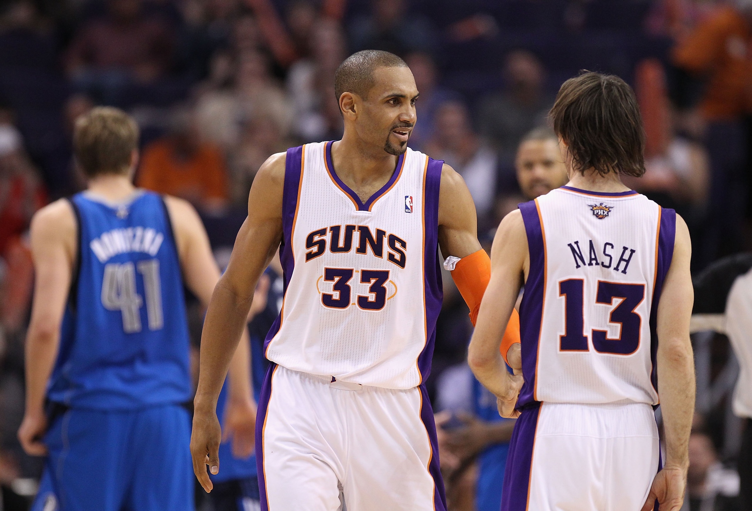 PHOENIX, AZ - FEBRUARY 17:  Grant Hill #33 and Steve Nash #13 of the Phoenix Suns during the NBA game against the Dallas Mavericks at US Airways Center on February 17, 2011 in Phoenix, Arizona.  The Mavericks defeated the Suns 112-106.  NOTE TO USER: User