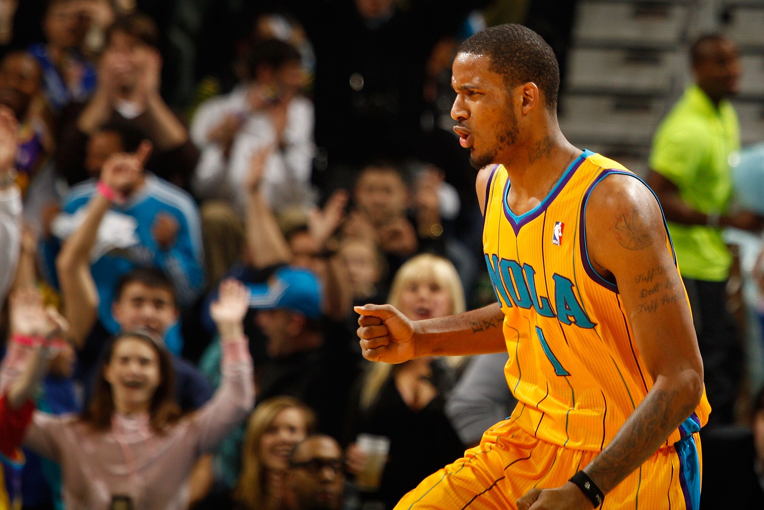 NEW ORLEANS, LA - JANUARY 22:  Trevor Ariza #1 of the New Orleans Hornets celebrates after a three point shot during the game against the San Antonio Spurs at the New Orleans Arena on January 22, 2011 in New Orleans, Louisiana.  The Hornets defeated the S