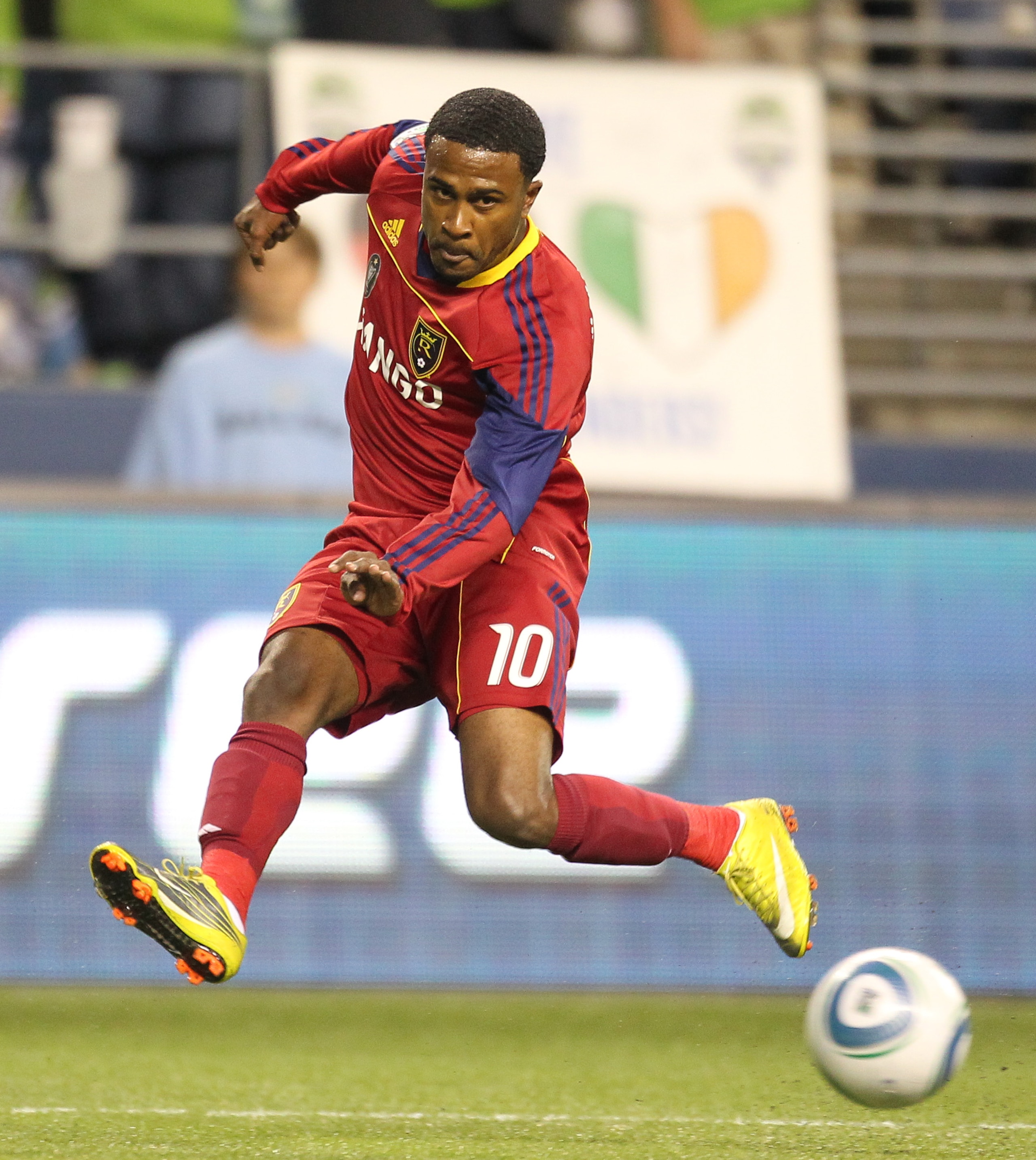 SEATTLE - SEPTEMBER 09:  Robbie Findley #10 of Real Salt Lake passes against the Seattle Sounders FC on September 9, 2010 at Qwest Field in Seattle, Washington. (Photo by Otto Greule Jr/Getty Images)