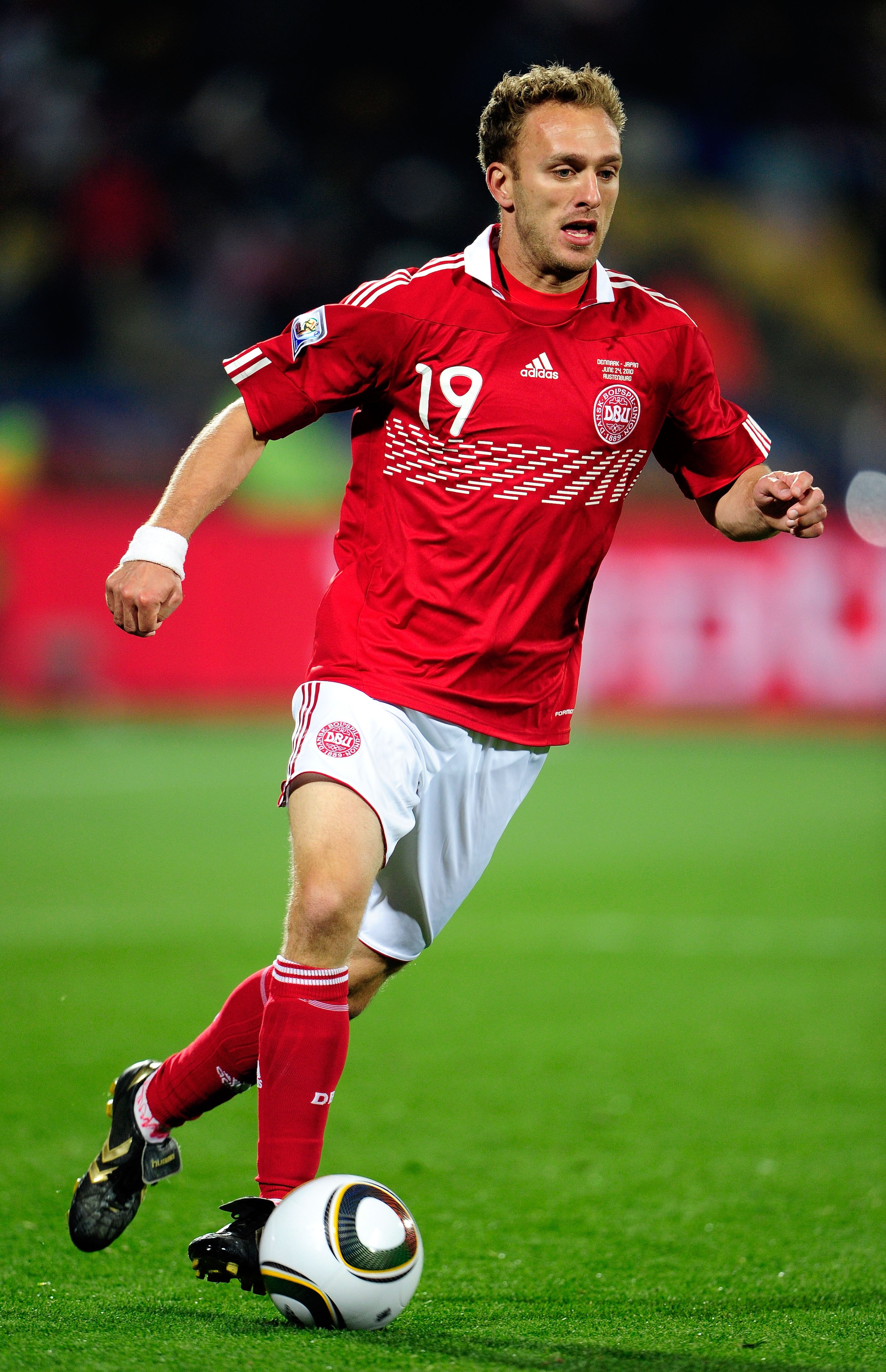 RUSTENBURG, SOUTH AFRICA - JUNE 24:  Dennis Rommedahl of Denmark in action during the 2010 FIFA World Cup South Africa Group E match between Denmark and Japan at the Royal Bafokeng Stadium on June 24, 2010 in Rustenburg, South Africa.  (Photo by Stuart Fr