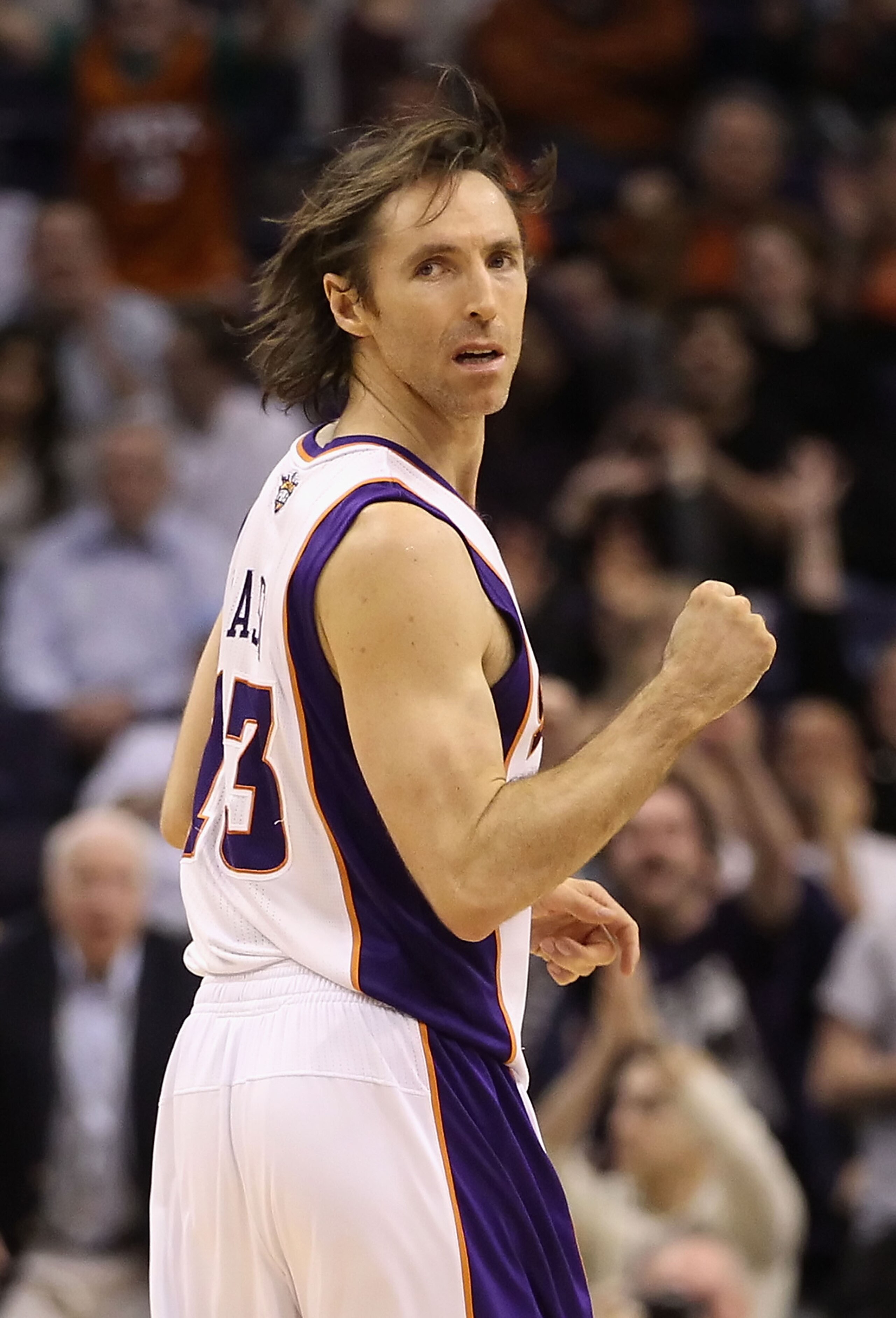 PHOENIX, AZ - JANUARY 14:  Steve Nash #13 of the Phoenix Suns pumps his fist after hitting a three point shot against the Portland Trail Blazers during the NBA game at US Airways Center on January 14, 2011 in Phoenix, Arizona.  The Suns defeated the 115-1