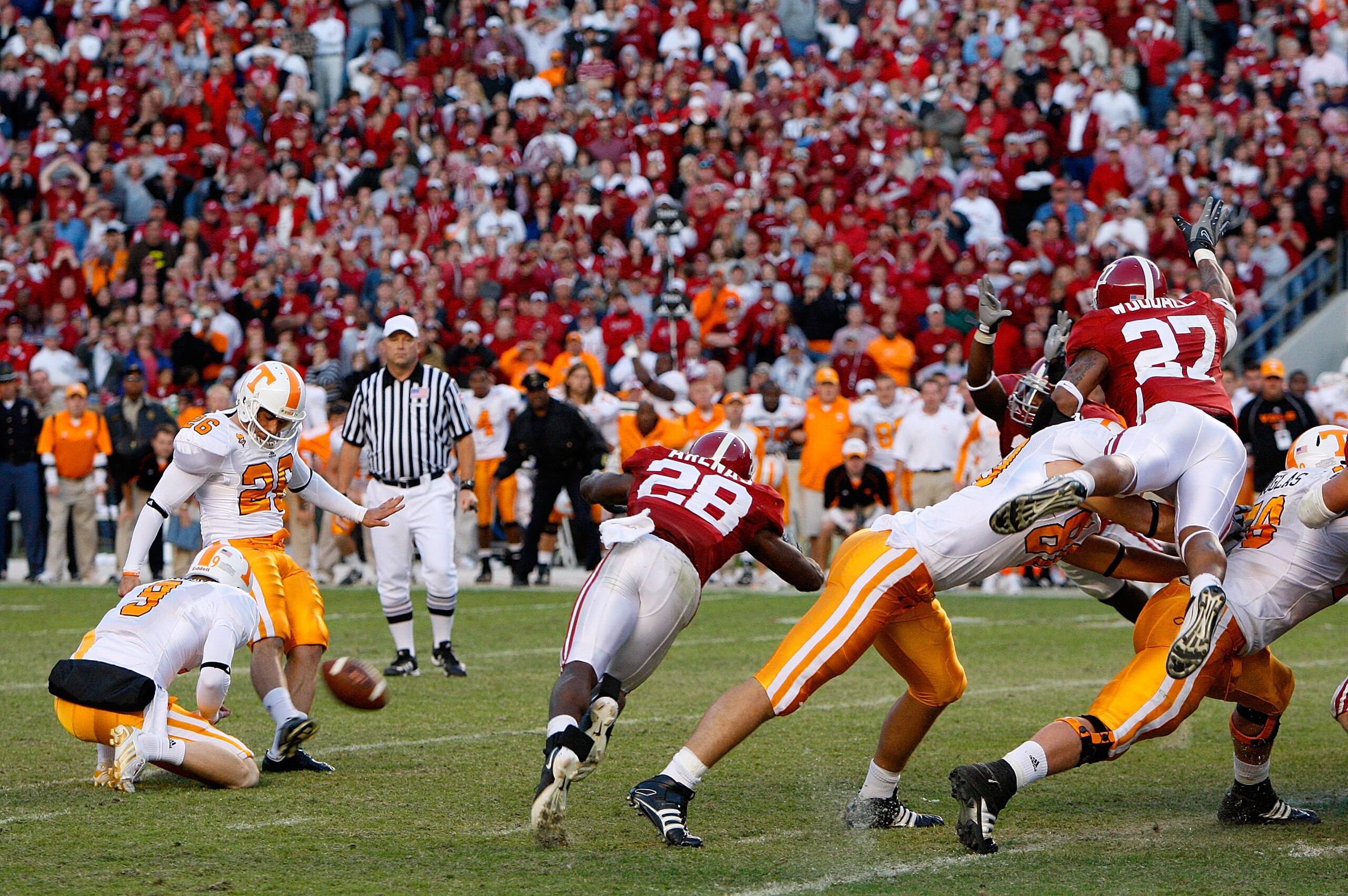 TUSCALOOSA, AL - OCTOBER 24:  Kicker Daniel Lincoln #26 of the Tennessee Volunteers kicks the game-winning field goal just before it is blocked by the Alabama Crimson Tide at Bryant-Denny Stadium on October 24, 2009 in Tuscaloosa, Alabama.  (Photo by Kevi