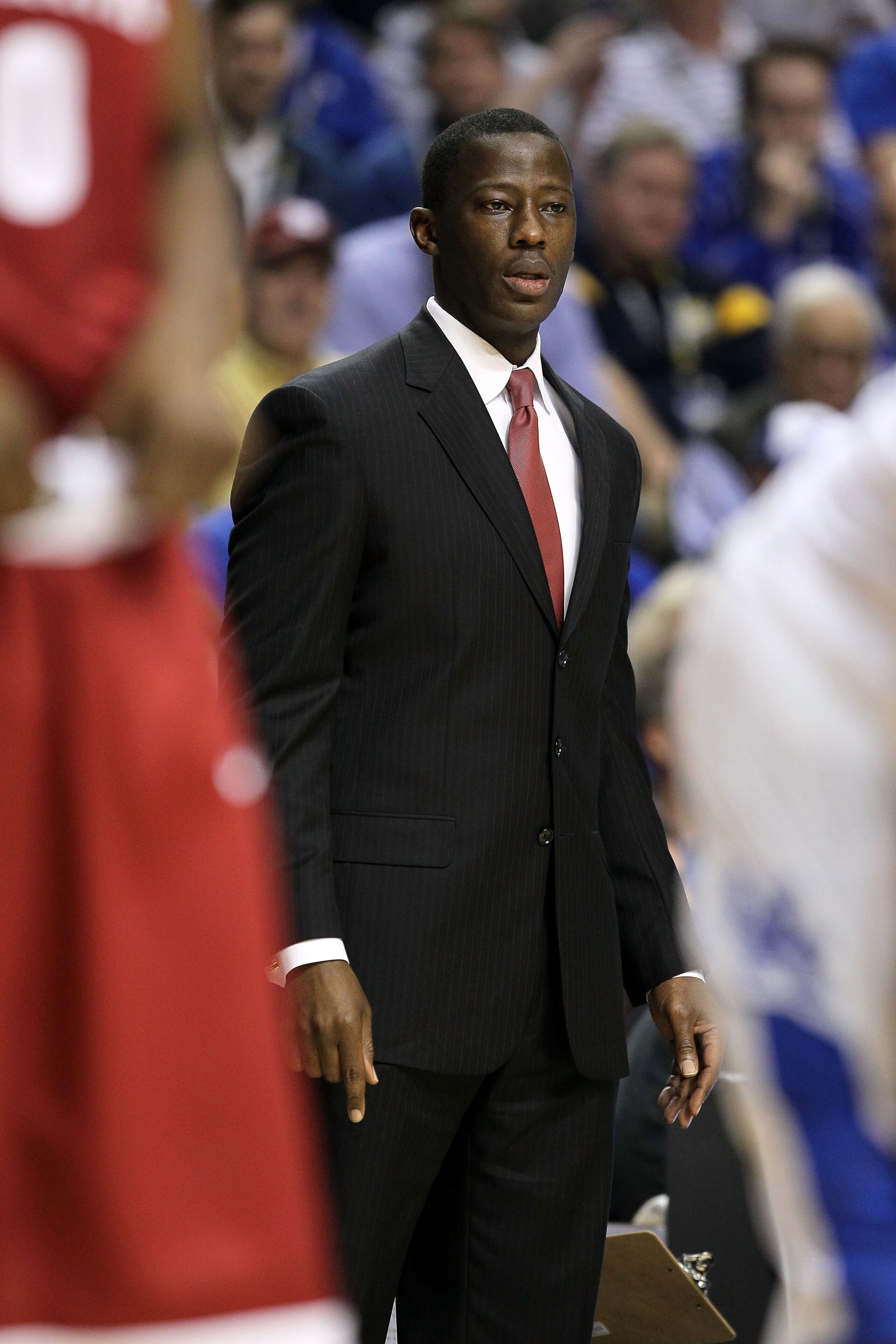 NASHVILLE, TN - MARCH 12:  Head coach Anthony Grant of the Alabama Crimson Tide looks on as he coaches against the Kentucky Wildcats during the quarterfinals of the SEC Men's Basketball Tournament at the Bridgestone Arena on March 12, 2010 in Nashville, T