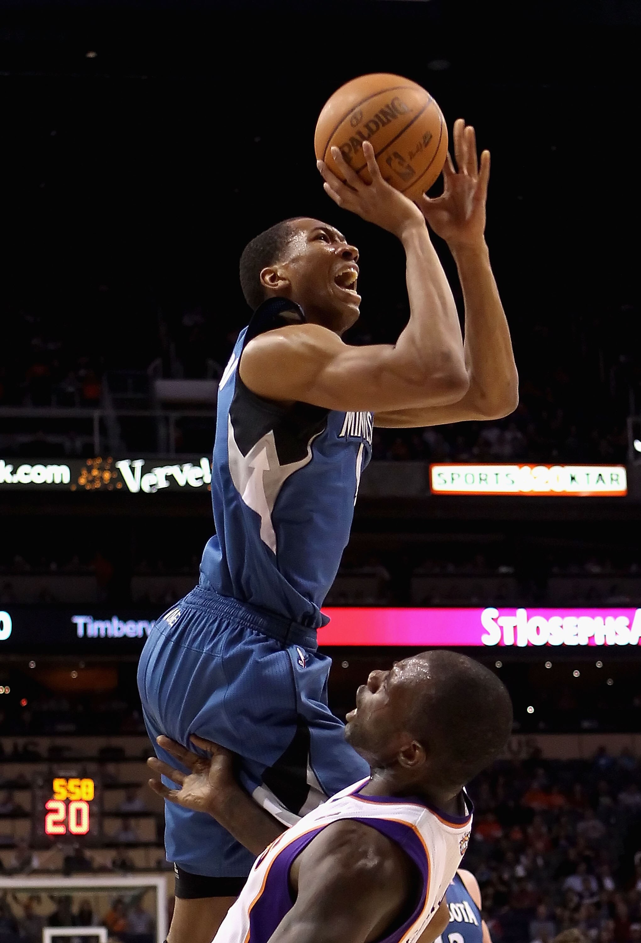PHOENIX - DECEMBER 15: Wesley Johnson #4 of the Minnesota Timberwolves drives to the basket over Grant Hill #13 of the Phoenix Suns during the NBA game at US Airways Center on December 15, 2010 in Phoenix, Arizona. The Suns defeated the Timberwolves 128- PHOENIX - DECEMBER 15: Wesley Johnson #4 of the Minnesota Timberwolves drives to the basket over Grant Hill #13 of the Phoenix Suns during the NBA game at US Airways Center on December 15, 2010 in Phoenix, Arizona. The Suns defeated the Timberwolves 128-