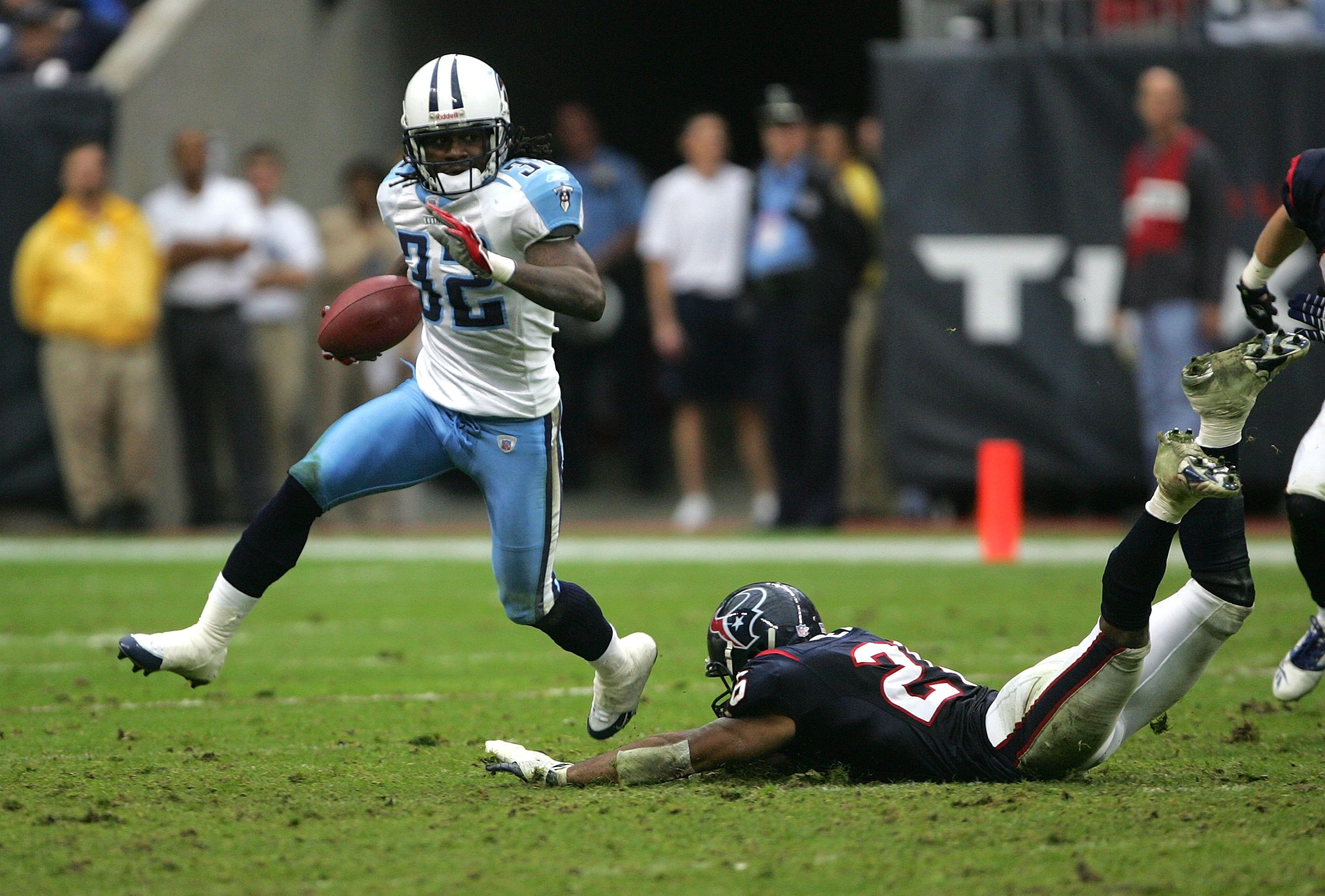 HOUSTON - DECEMBER 10:   Pacman Jones #32 of the Tennessee Titans returns the opening kickoff of the overtime period against the Houston Texans on December 10, 2006 at Reliant Stadium in Houston, Texas.  The Titans won 26-20 in overtime. (Photo by Stephen