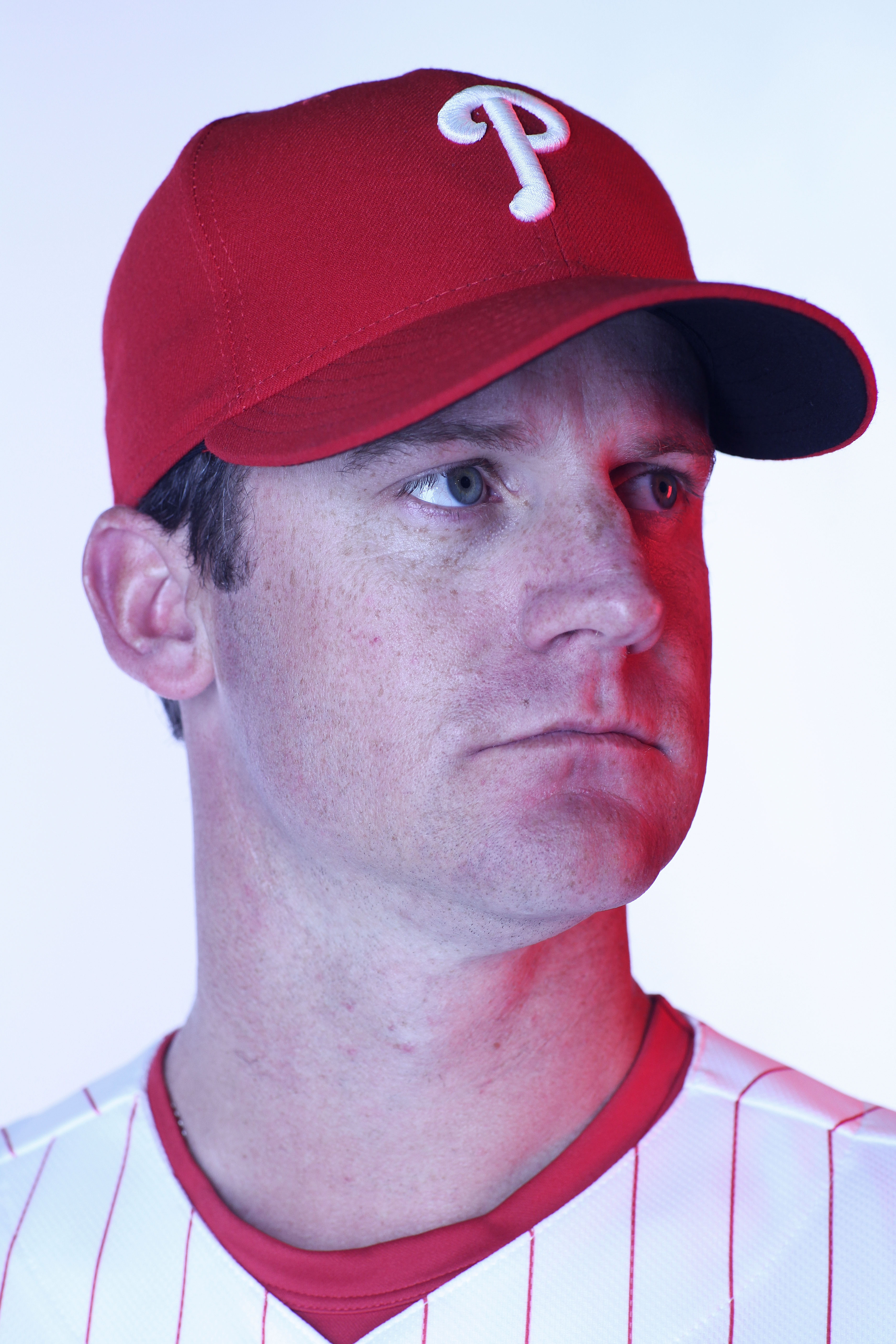 CLEARWATER, FL - FEBRUARY 22:  (EDITORS NOTE: Image was shot with a colored gel on lights) Roy Oswalt #44 of the Philadelphia Phillies poses for a photo during Spring Training Media Photo Day at Bright House Networks Field on February 22, 2011 in Clearwat