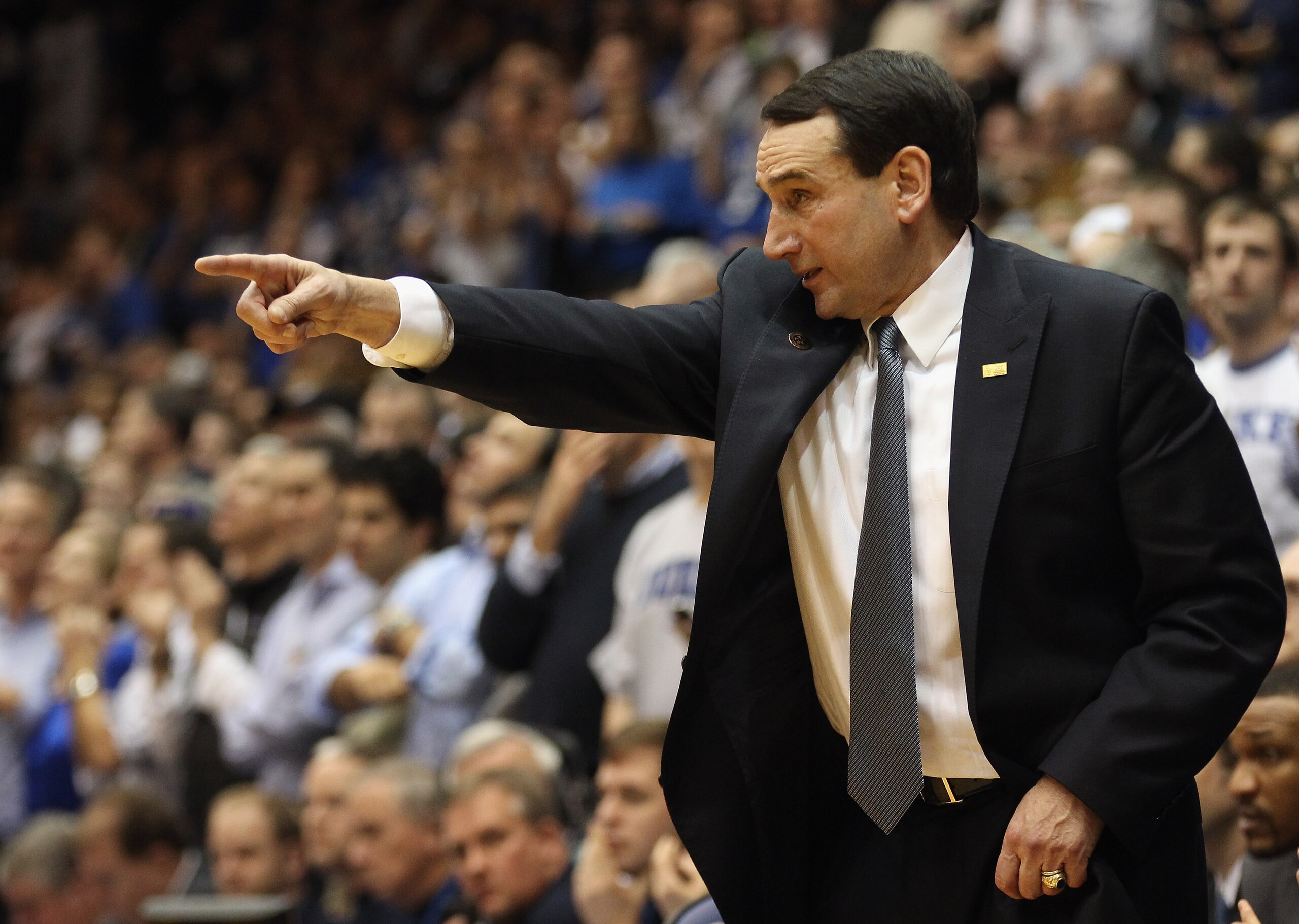 DURHAM, NC - FEBRUARY 09:  Head coach Mike Krzyzewski of the Duke Blue Devils yells to his team during their game against the North Carolina Tar Heels at Cameron Indoor Stadium on February 9, 2011 in Durham, North Carolina.  (Photo by Streeter Lecka/Getty
