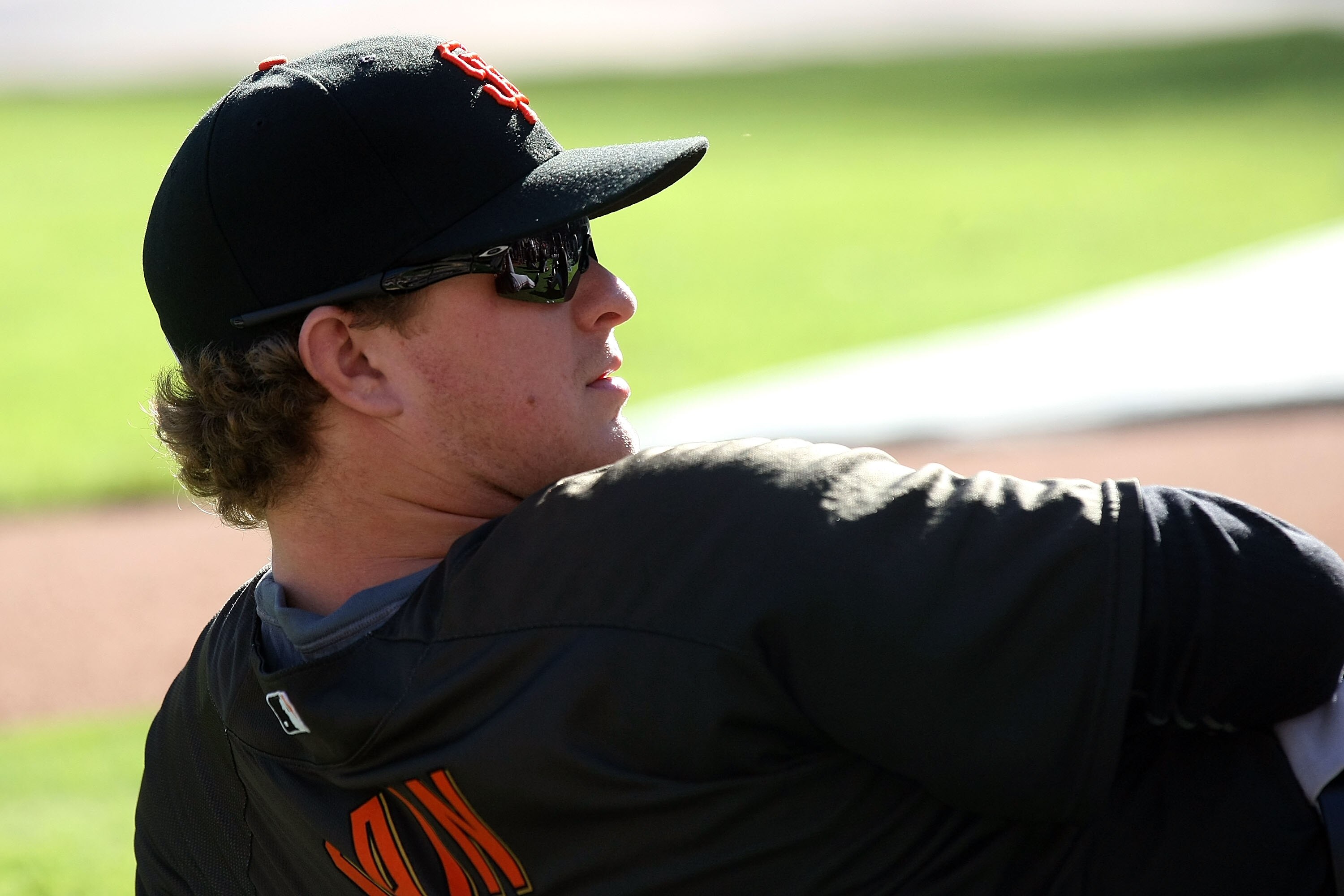 ARLINGTON, TX - OCTOBER 30:  Matt Cain #18 of the San Francisco Giants looks on during batting practice against the Texas Rangers in Game Three of the 2010 MLB World Series at Rangers Ballpark in Arlington on October 30, 2010 in Arlington, Texas.  (Photo