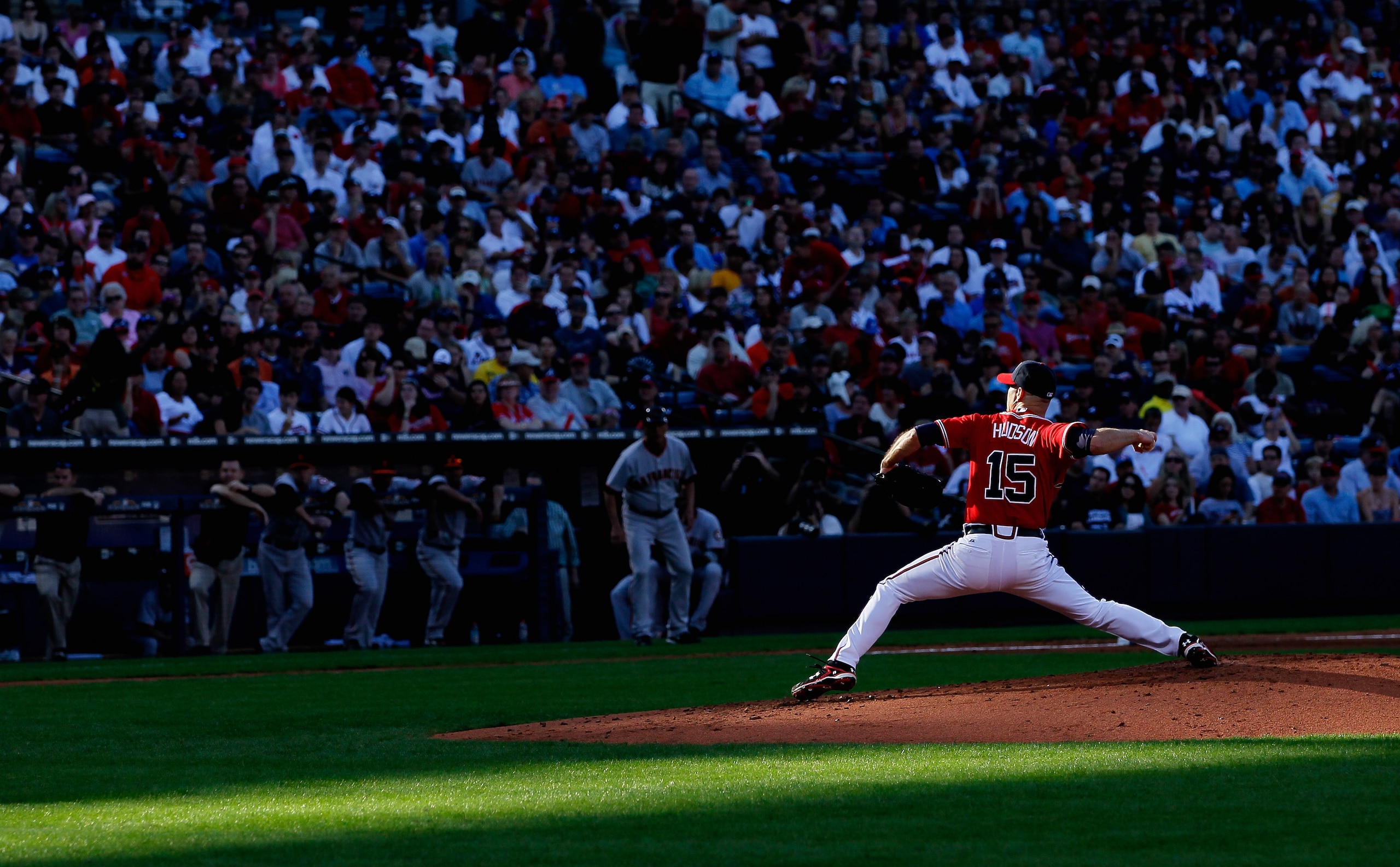 ATLANTA - OCTOBER 10:  Starting pitcher Tim Hudson #15 of the Atlanta Braves pitches to the San Francisco Giants during Game Three of the NLDS of the 2010 MLB Playoffs at Turner Field on October 10, 2010 in Atlanta, Georgia.  (Photo by Kevin C. Cox/Getty