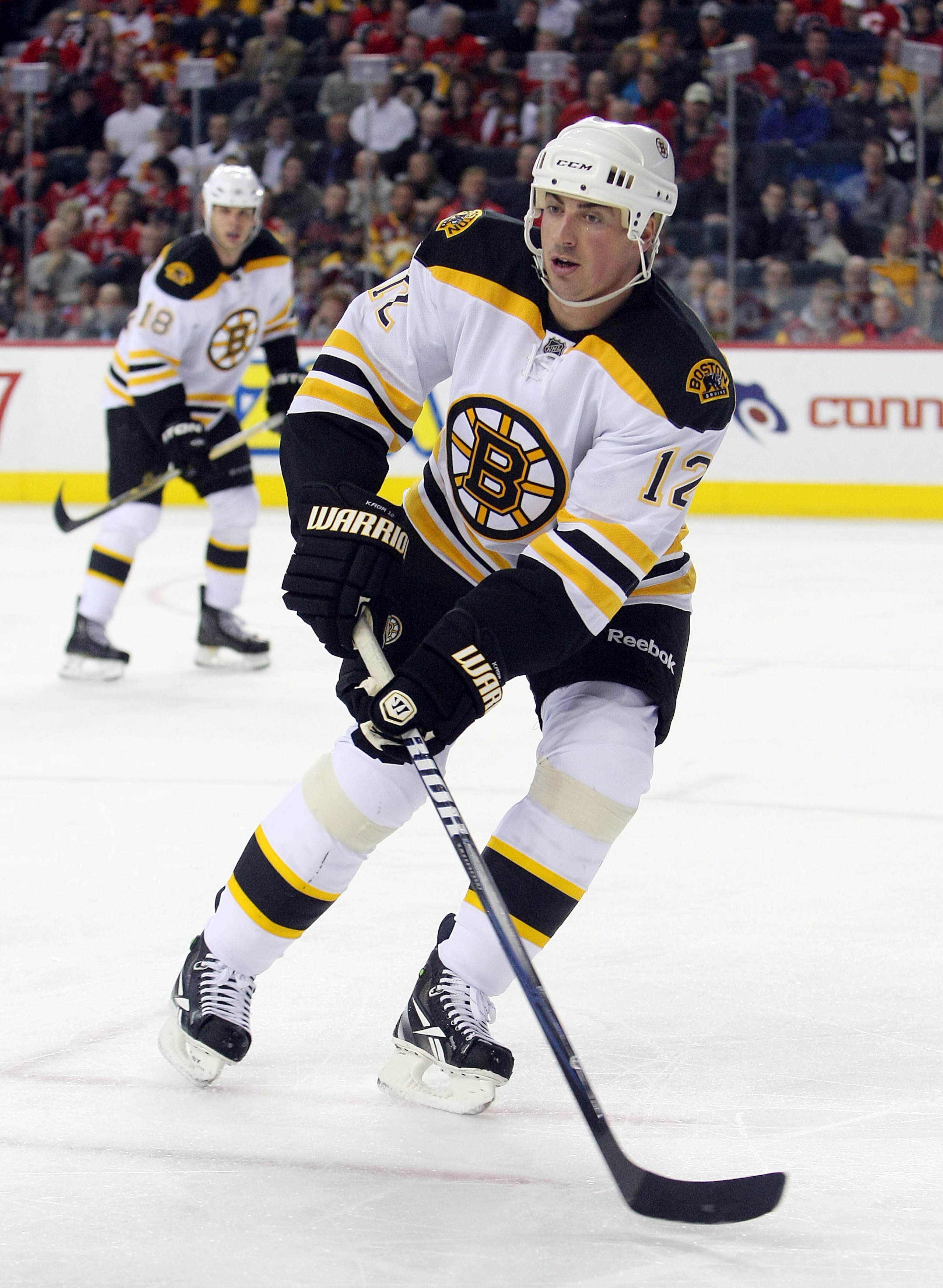 CALGARY,CANADA - FEBRUARY 22:  Tomas Kaberle #12 of the Boston Bruins skates against the Calgary Flames during their NHL game at Scotiabank Saddledome, February 22,2011 in Calgary, Alberta, Canada.(Photo By Dave Sandford/Getty Images)