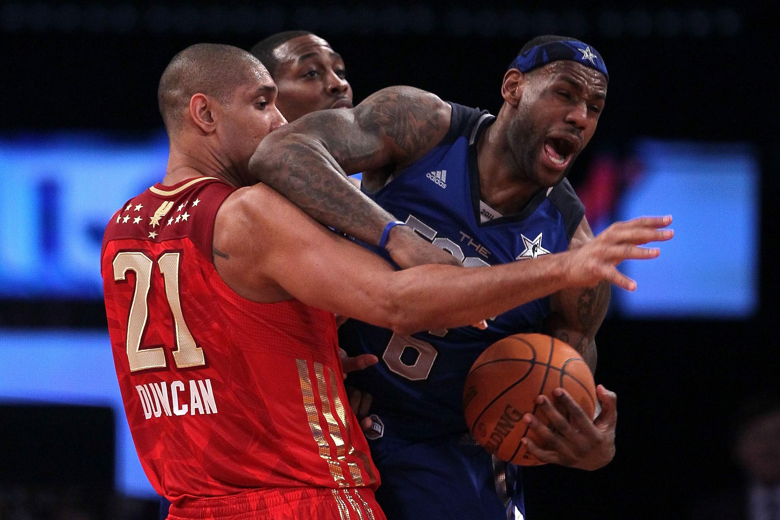 LOS ANGELES, CA - FEBRUARY 20:  LeBron James #6 of the Miami Heat and the Eastern Conference reacts as he is guarded by Tim Duncan #21 of the San Antonio Spurs and the Western Conference in the 2011 NBA All-Star Game at Staples Center on February 20, 2011