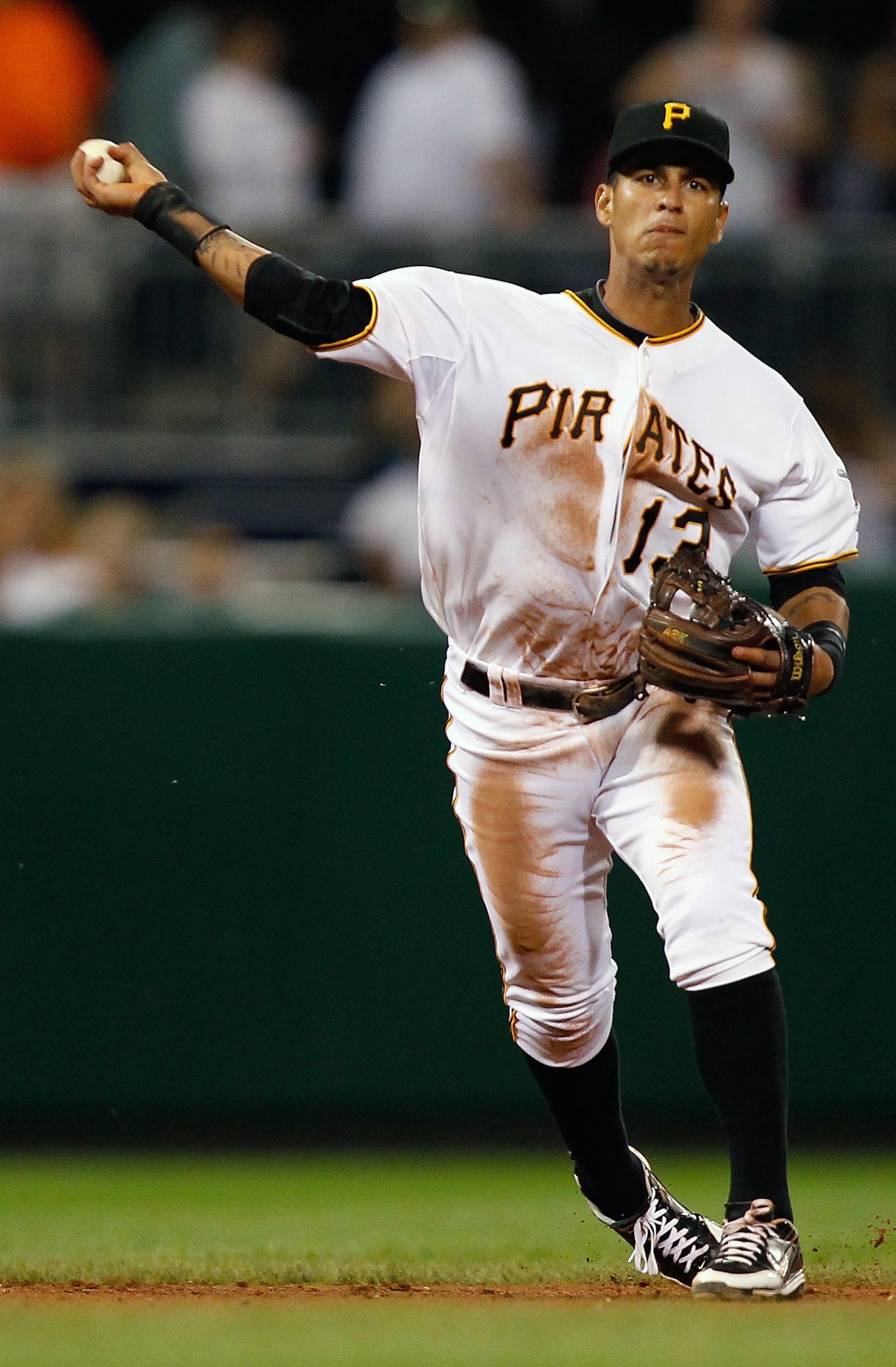 PITTSBURGH - AUGUST 25:  Ronny Cedeno #13 of the Pittsburgh Pirates throws to first base during the game against the St Louis Cardinals on August 25, 2010 at PNC Park in Pittsburgh, Pennsylvania.  (Photo by Jared Wickerham/Getty Images)