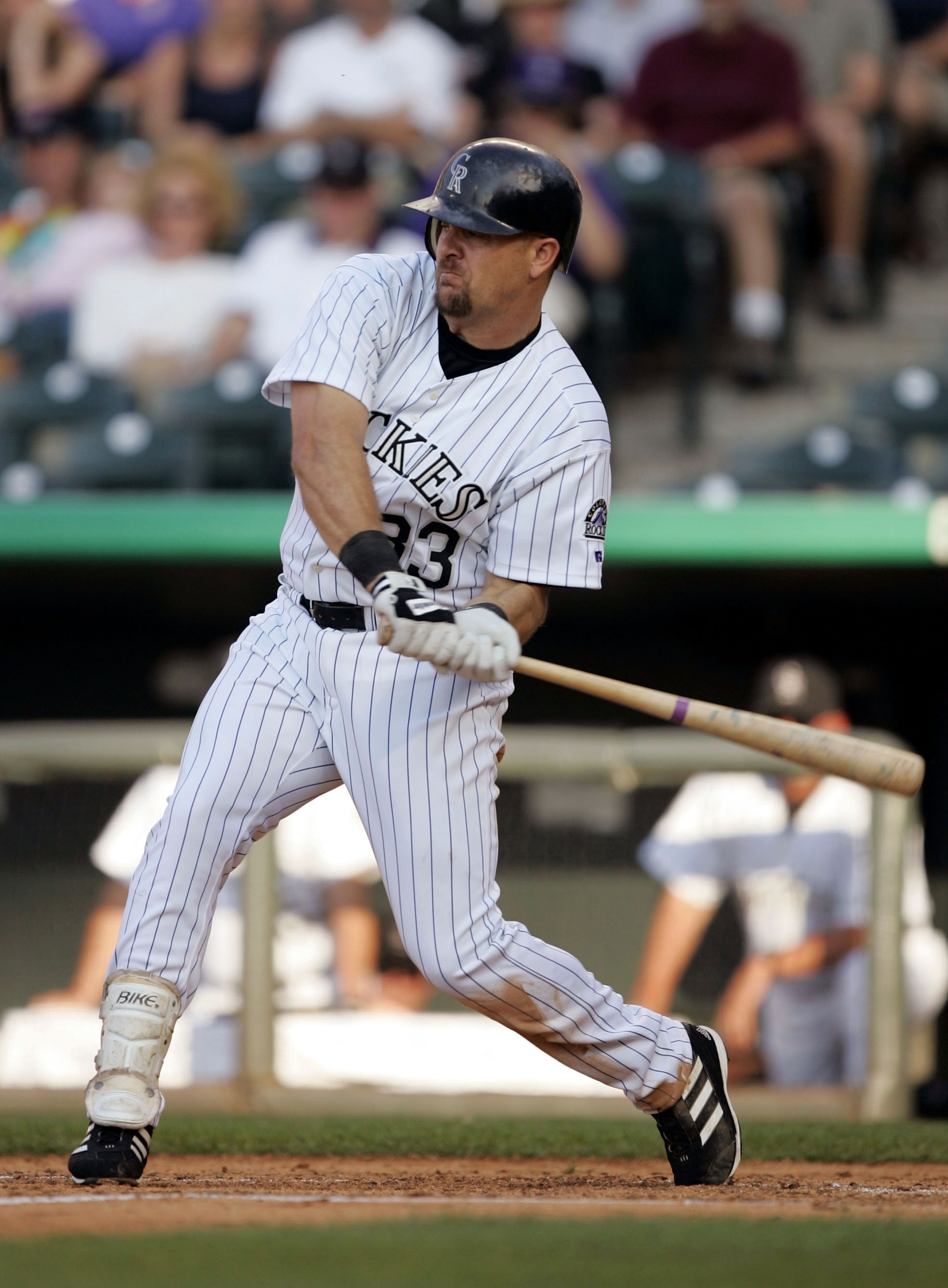 DENVER - JULY 2:  Larry Walker #33 of the Colorado Rockies bats against the Detroit Tigers on July 2, 2004 at Coors Field in Denver, Colorado.  (Photo by Brian Bahr/Getty Images)