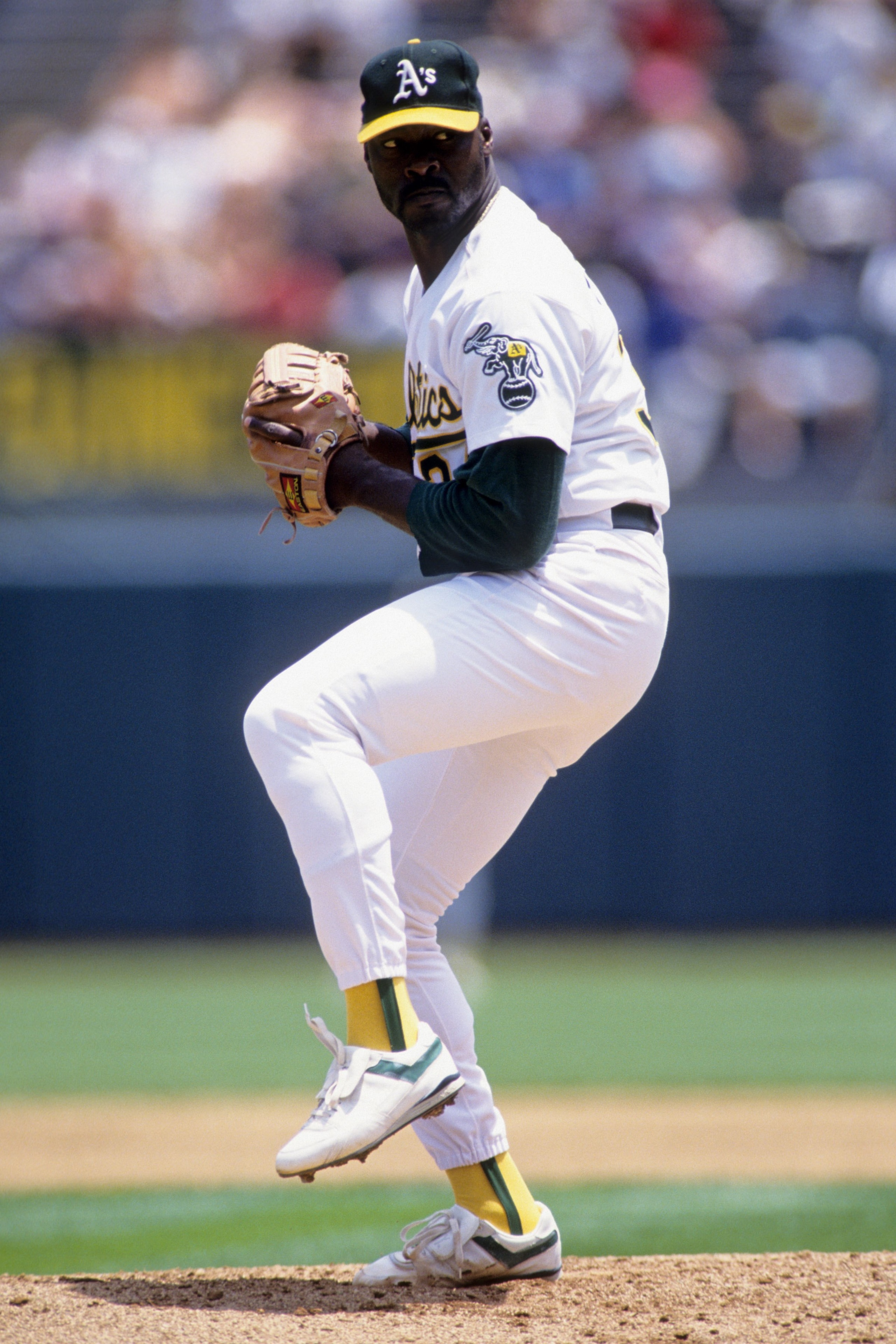 OAKLAND, CA - JUNE 24:  Dave Stewart #34 of the Oakland Athletics pitches during an MLB game against the Seattle Mariners on June 24, 1992 at Oakland-Alameda County Coliseum in Oakland, California. (Photo by Otto Greule Jr./Getty Images)