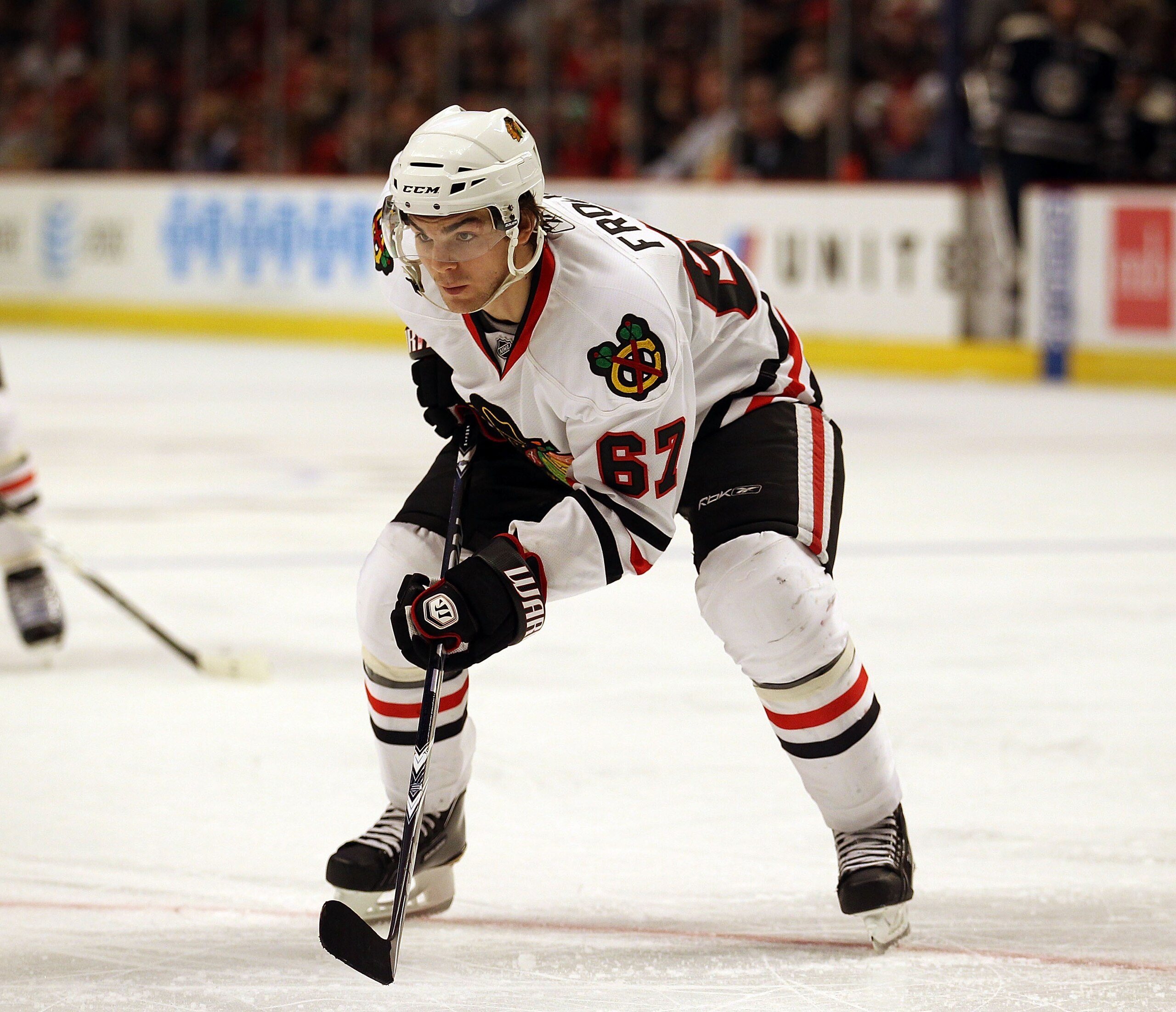 CHICAGO, IL - FEBRUARY 18: Michael Frolik #67 of the Chicago Blackhawks awaits a face-off against the Columbus Blue Jackets at the United Center on February 18, 2011 in Chicago, Illinois. The Blue Jackets defeated the Blackhawks 4-3. (Photo by Jonathan Da