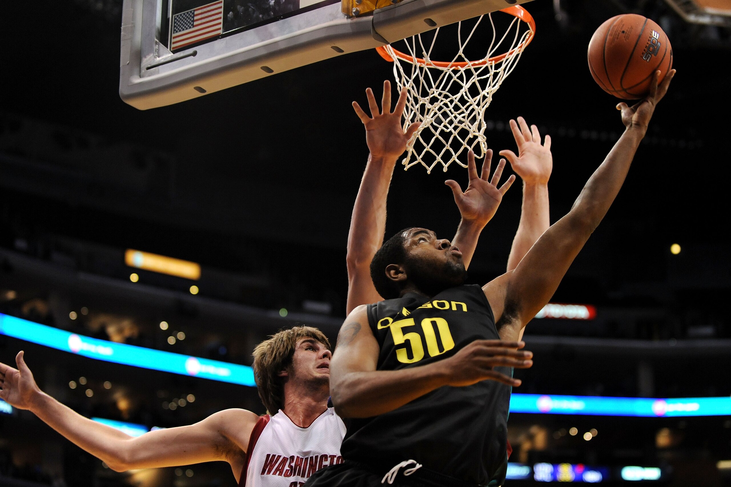 LOS ANGELES, CA - MARCH 11:  Joevan Catron #50 of the Oregon Ducks shoots against the Washington State Cougars during the Pacific Life Pac-10 Men's Basketball Tournament at the Staples Center on March 11, 2009 in Los Angeles, California.  (Photo by Harry