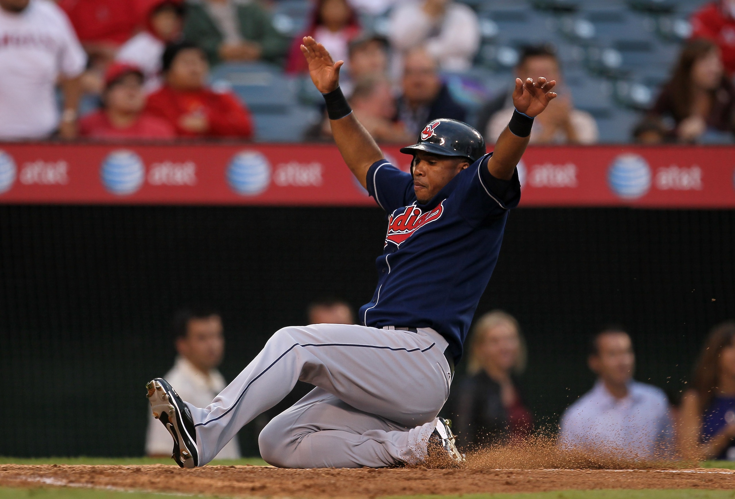 ANAHEIM, CA - SEPTEMBER 08: Luis Valbuena #1 of the Cleveland Indian slides home with the tying run in the ninth inning against the Los Angeles Angels of Anaheim on September 8, 2010 at Angel Stadium in Anaheim, California. The Angels won 4-3 in 16 in ANAHEIM, CA - SEPTEMBER 08: Luis Valbuena #1 of the Cleveland Indian slides home with the tying run in the ninth inning against the Los Angeles Angels of Anaheim on September 8, 2010 at Angel Stadium in Anaheim, California. The Angels won 4-3 in 16 in