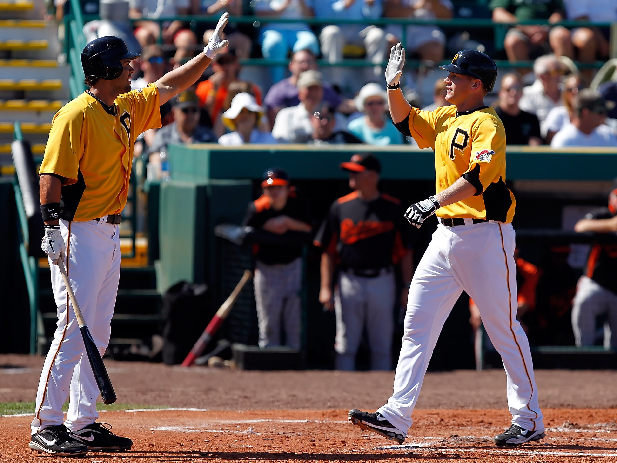 BRADENTON, FL - FEBRUARY 28:  First baseman Lyle Overbay #37 of the Pittsburgh Pirates is congratulated by outfielder Garrett Jones #46 after his home run against the Baltimore Orioles during a Grapefruit League Spring Training Game at McKechnie Field on