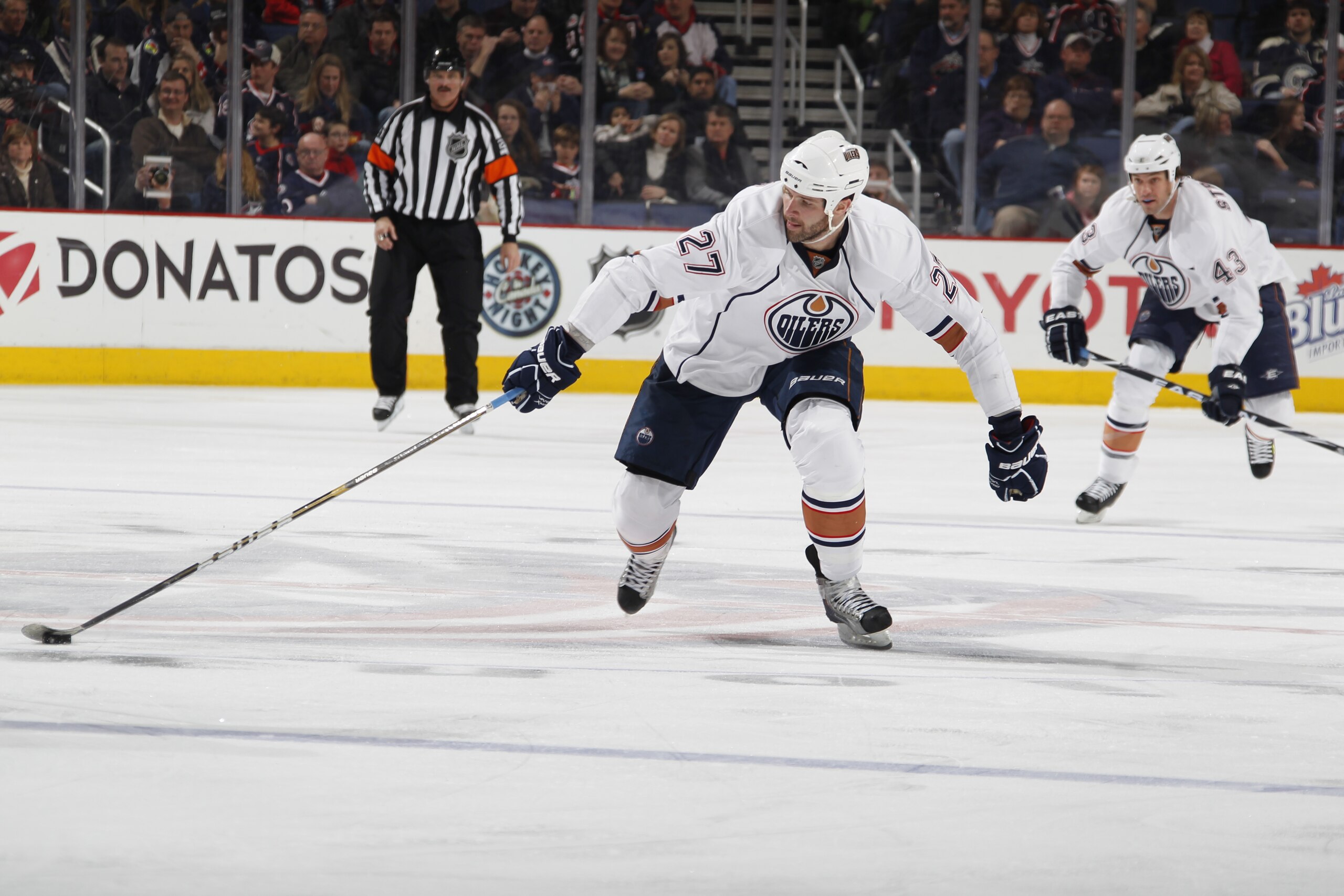 COLUMBUS, OH - FEBRUARY 05: Dustin Penner #27 of the Edmonton Oilers skates with the puck against the Columbus Blue Jackets at Nationwide Arena on February 5, 2011 in Columbus, Ohio.  (Photo by Gregory Shamus/Getty Images)