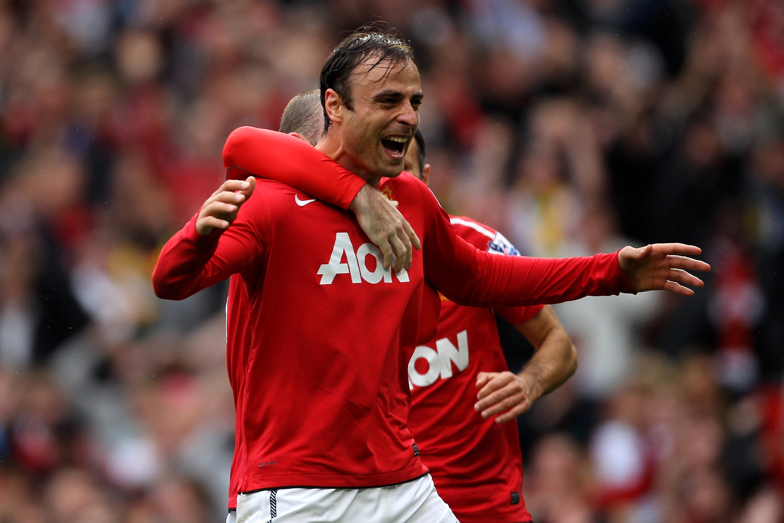 MANCHESTER, ENGLAND - SEPTEMBER 19:  Dimitar Berbatov of Manchester United celebrates scoring his team's second goal during the Barclays Premier League match between Manchester United and Liverpool at Old Trafford on September 19, 2010 in Manchester, Engl