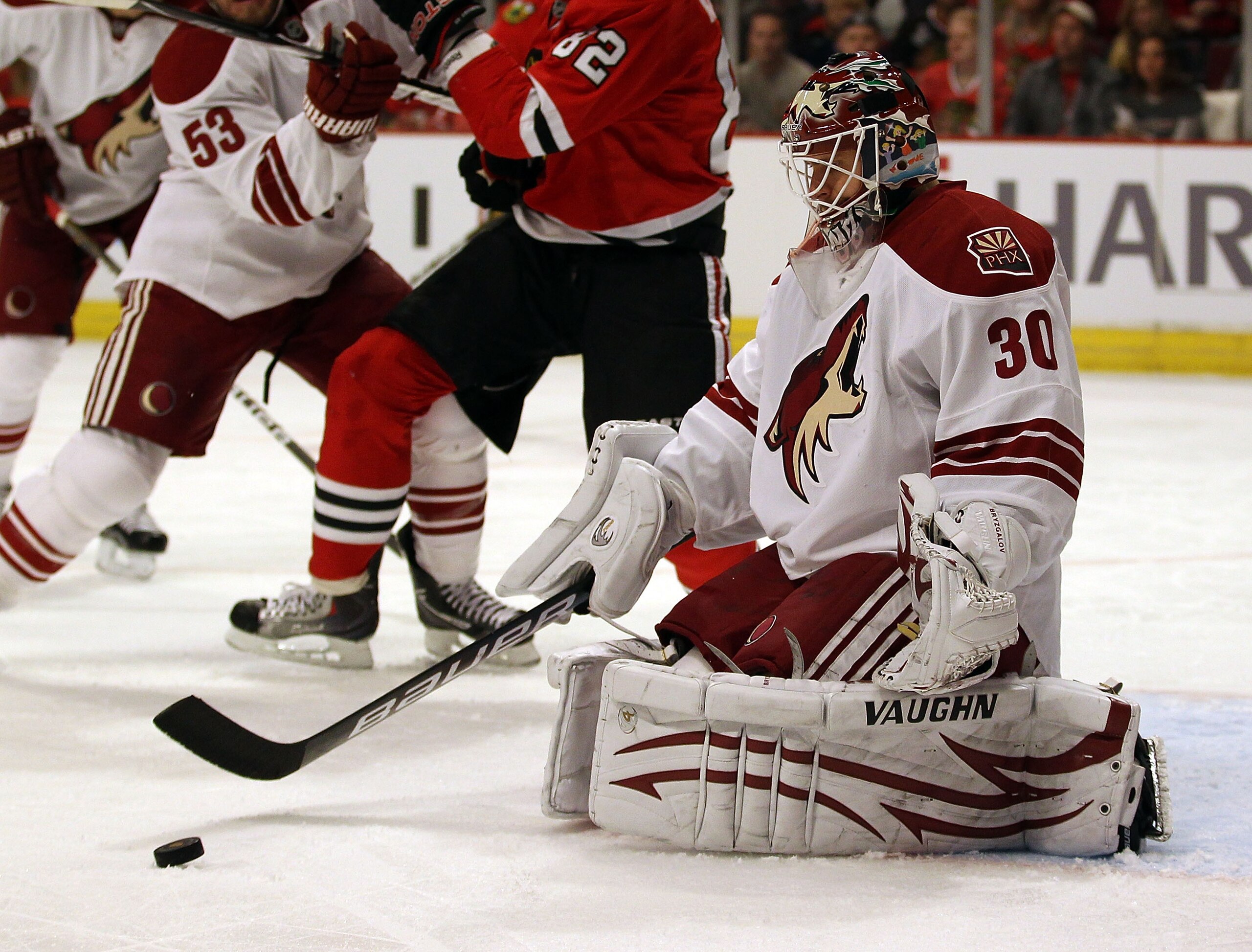 CHICAGO, IL - FEBRUARY 27: Ilya Bryzgalov #30 of the Phoenix Coyotes stops a shot against the Chicago Blackhawks at the United Center on February 27, 2011 in Chicago, Illinois. The Blackhawks defeated the Coyotes 4-3 in a shootout.  (Photo by Jonathan Dan