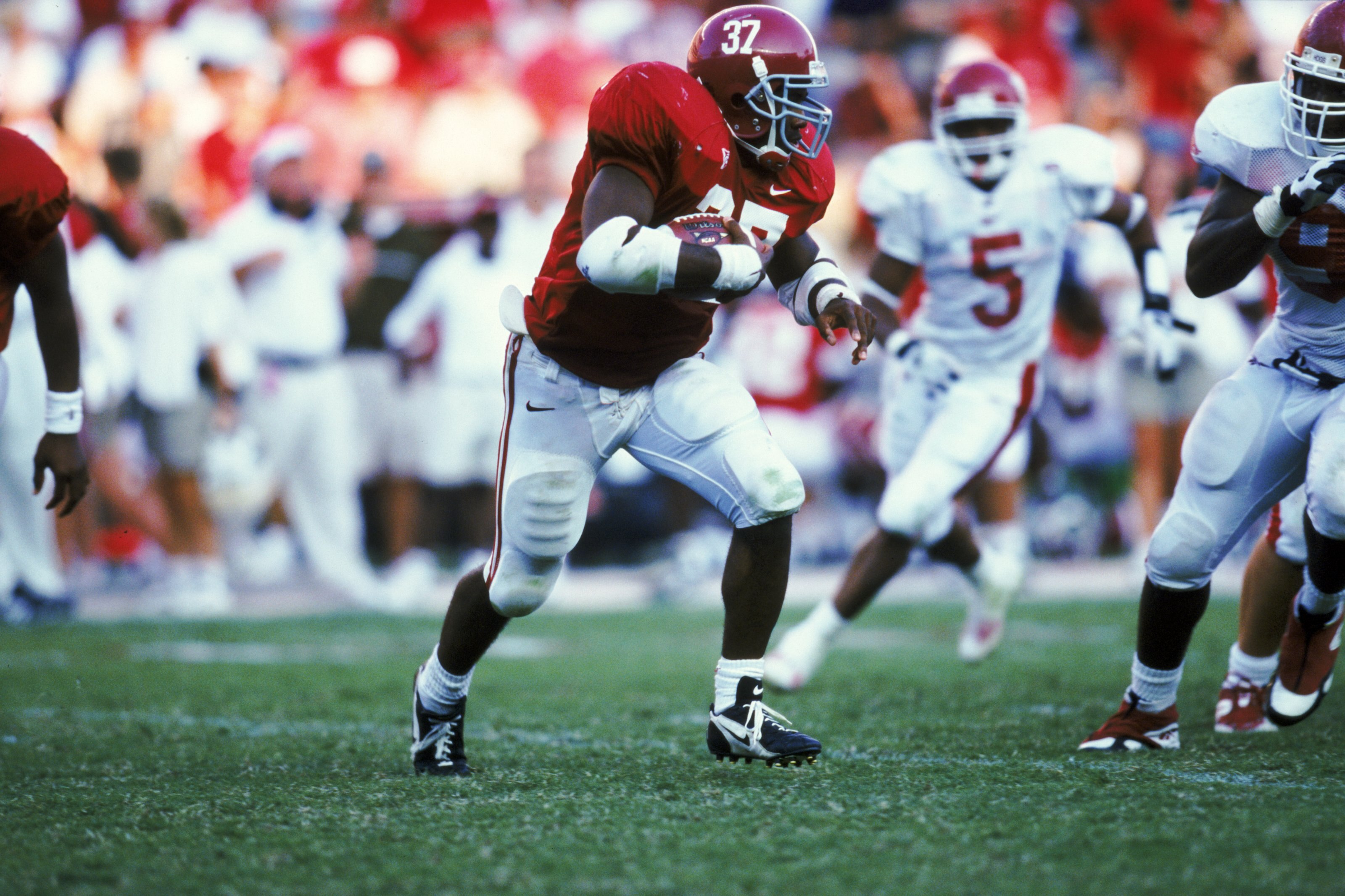 25 Sep 1999: Shaun Alexander #37 of the Alabama Crimson Tide carries the ball during the game against the Arkansas Razorbacks at the Bryant-Denny Stadium in Tuscaloosa, Alabama. The Crimson Tide defeated the Razorbacks 35-28. Mandatory Credit: Tom Hauck