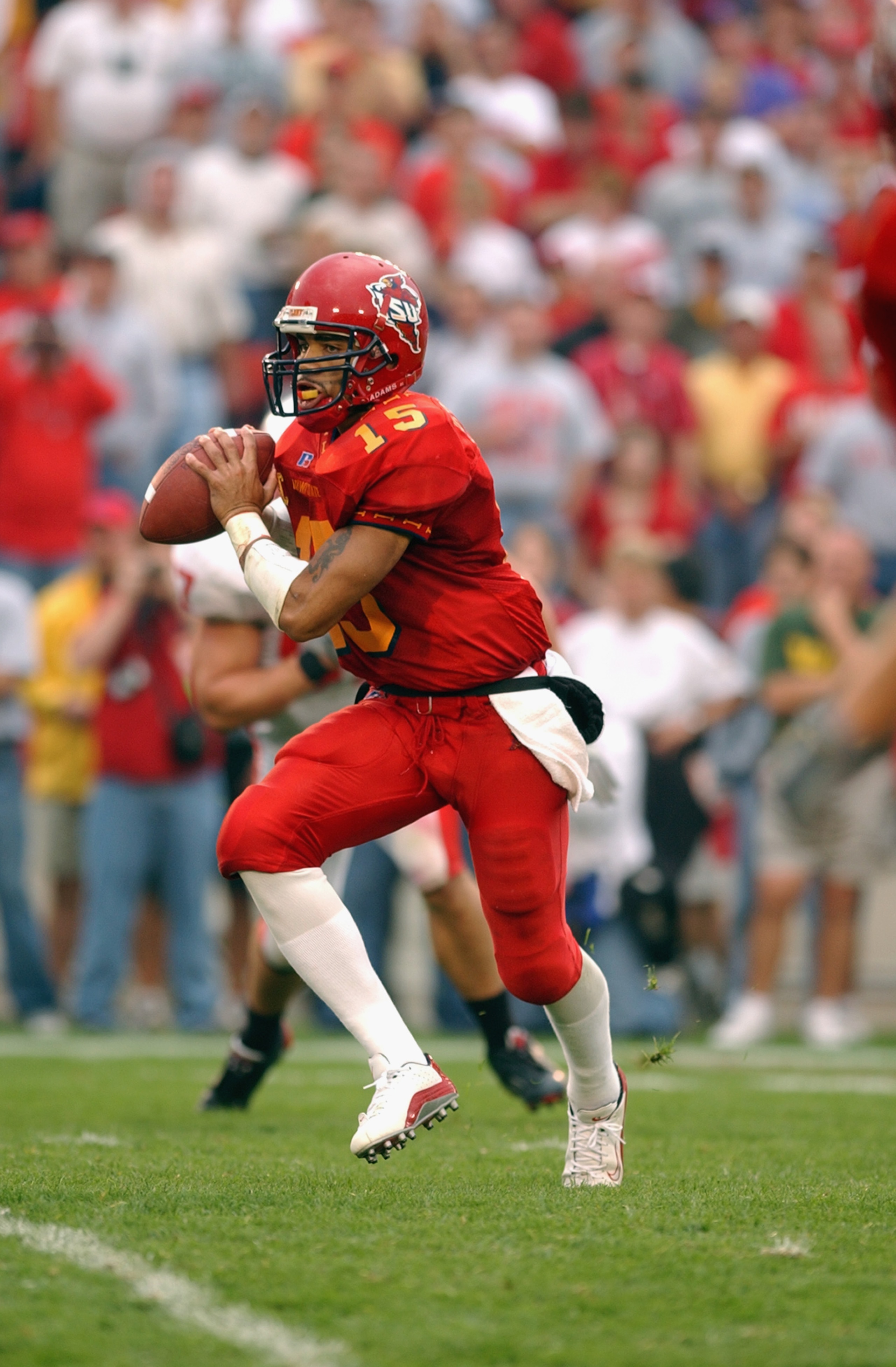 AMES, IA - SEPTEMBER 28: Quarterback Seneca Wallace #15 of the Iowa State Cyclones looks to pass during the Big 12 Conference football game against the Nebraska Cornhuskers on September 28, 2002 at Jack Trice Stadium in Ames, Iowa. The Cyclones won 36-1 AMES, IA - SEPTEMBER 28: Quarterback Seneca Wallace #15 of the Iowa State Cyclones looks to pass during the Big 12 Conference football game against the Nebraska Cornhuskers on September 28, 2002 at Jack Trice Stadium in Ames, Iowa. The Cyclones won 36-1