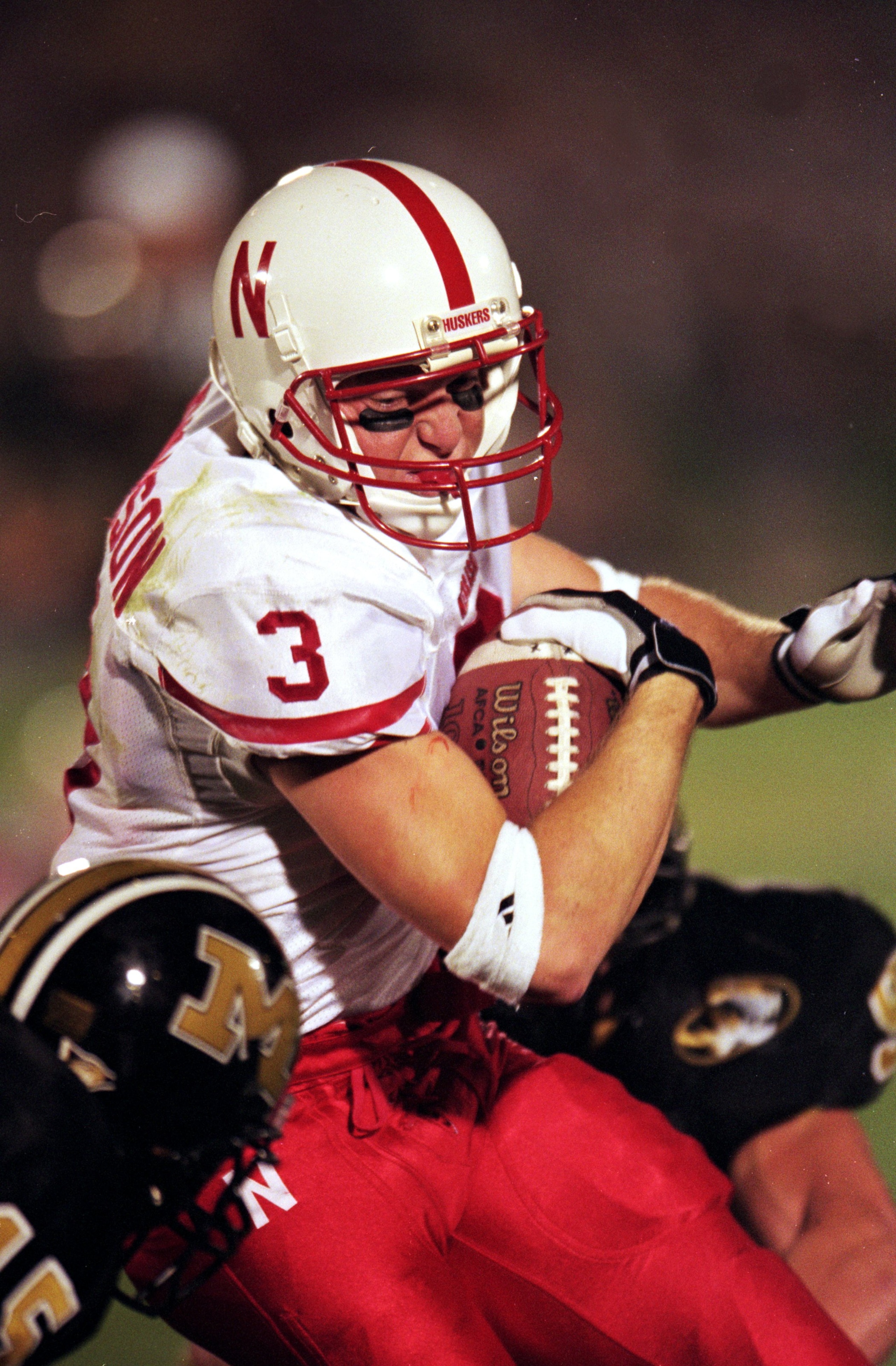 25 Sep 1999: Matt Davison #3 of the Nebraska Cornhuskers carries the ball as he is tackled during the game against the Missouri Tigers at Faurot Field in Columbia, Mossouri. The Cornhuskers defeated the Tigers 41-21. Mandatory Credit: Elsa Hasch /Allsp 25 Sep 1999: Matt Davison #3 of the Nebraska Cornhuskers carries the ball as he is tackled during the game against the Missouri Tigers at Faurot Field in Columbia, Mossouri. The Cornhuskers defeated the Tigers 41-21. Mandatory Credit: Elsa Hasch /Allsp