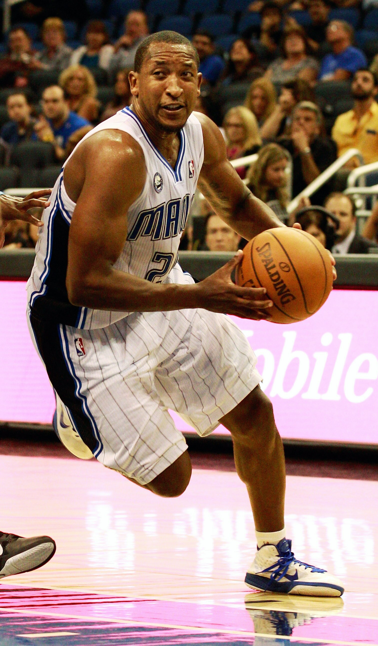 ORLANDO, FL - OCTOBER 10:  Chris Duhon #25 of the Orlando Magic drives toward the basket during the game against the New Orleans Hornets at Amway Arena on October 10, 2010 in Orlando, Florida. NOTE TO USER: User expressly acknowledges and agrees that, by