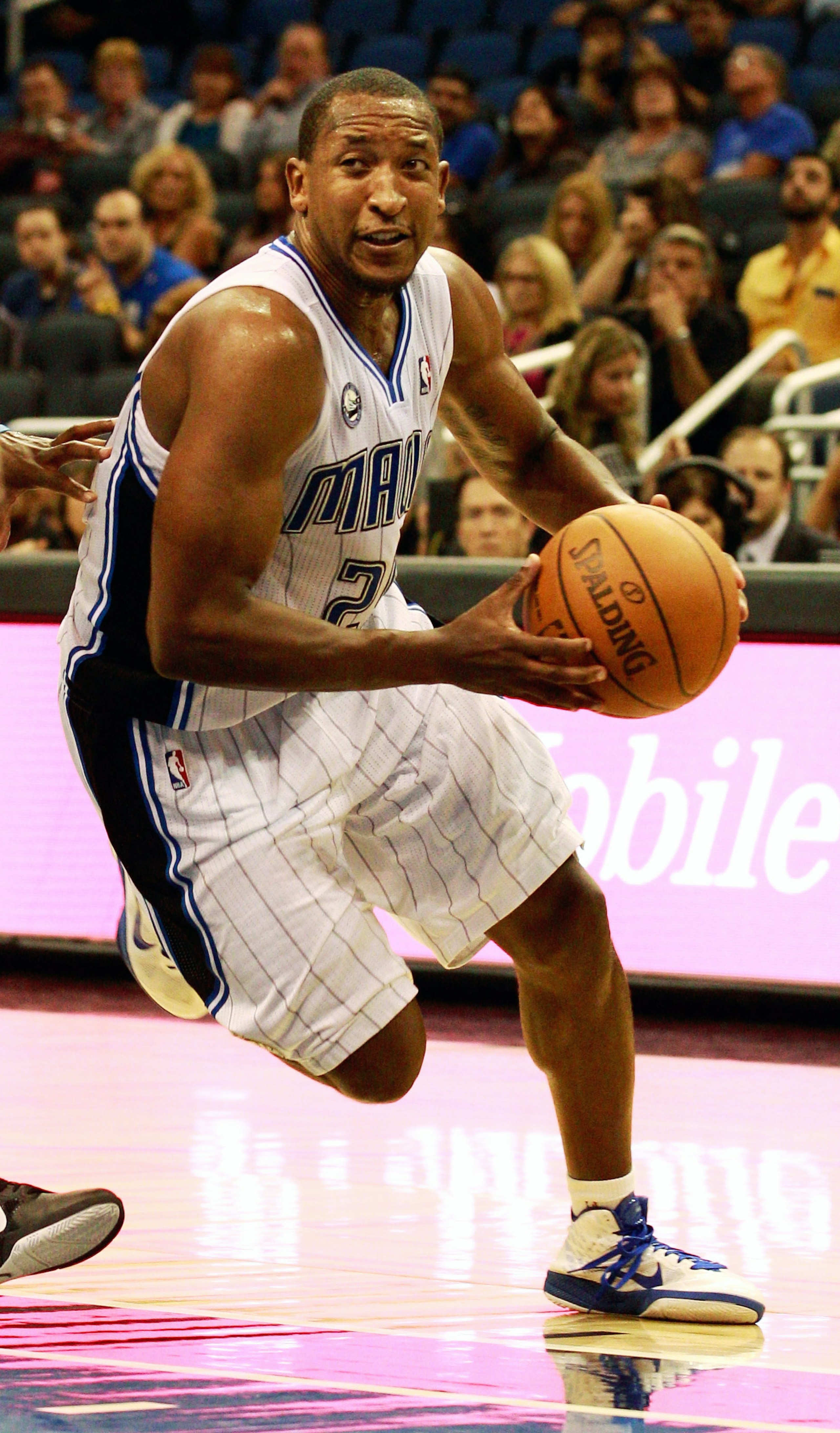 ORLANDO, FL - OCTOBER 10:  Chris Duhon #25 of the Orlando Magic drives toward the basket during the game against the New Orleans Hornets at Amway Arena on October 10, 2010 in Orlando, Florida. NOTE TO USER: User expressly acknowledges and agrees that, by