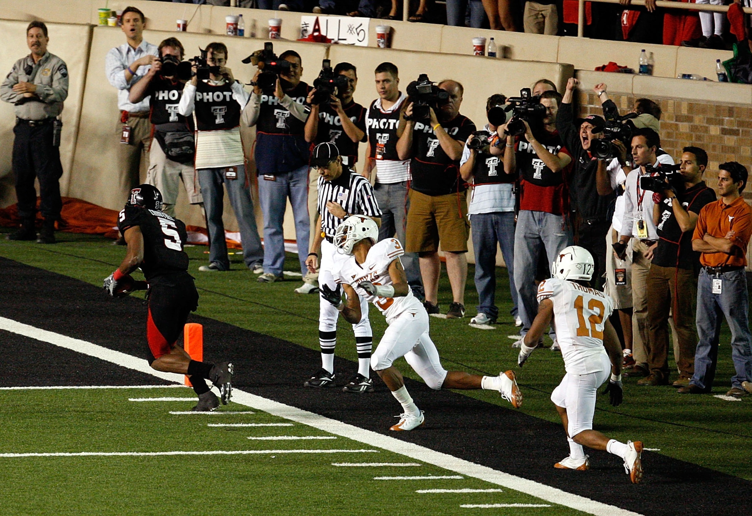 LUBBOCK, TX - NOVEMBER 01: Michael Crabtree #5 of the Texas Tech Red Raiders carries the ball into the end zone to score the winning touchdown during the game against the Texas Longhorns on November 1, 2008 at Jones Stadium in Lubbock, Texas. (Photo by LUBBOCK, TX - NOVEMBER 01: Michael Crabtree #5 of the Texas Tech Red Raiders carries the ball into the end zone to score the winning touchdown during the game against the Texas Longhorns on November 1, 2008 at Jones Stadium in Lubbock, Texas. (Photo by