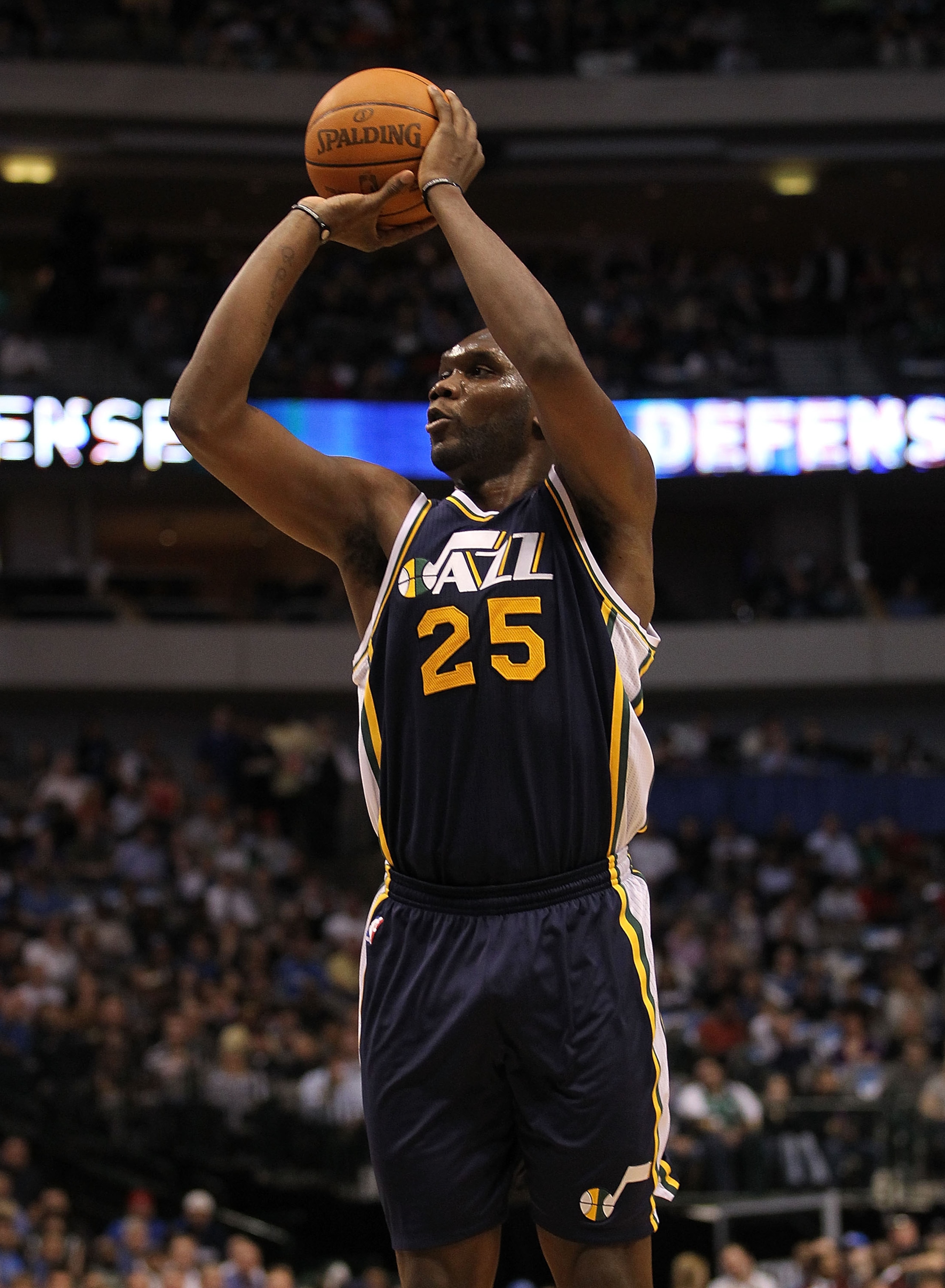 DALLAS, TX - FEBRUARY 23:  Forward Al Jefferson  #25 of the Utah Jazz takes a shot against the Dallas Mavericks at American Airlines Center on February 23, 2011 in Dallas, Texas.  NOTE TO USER: User expressly acknowledges and agrees that, by downloading a