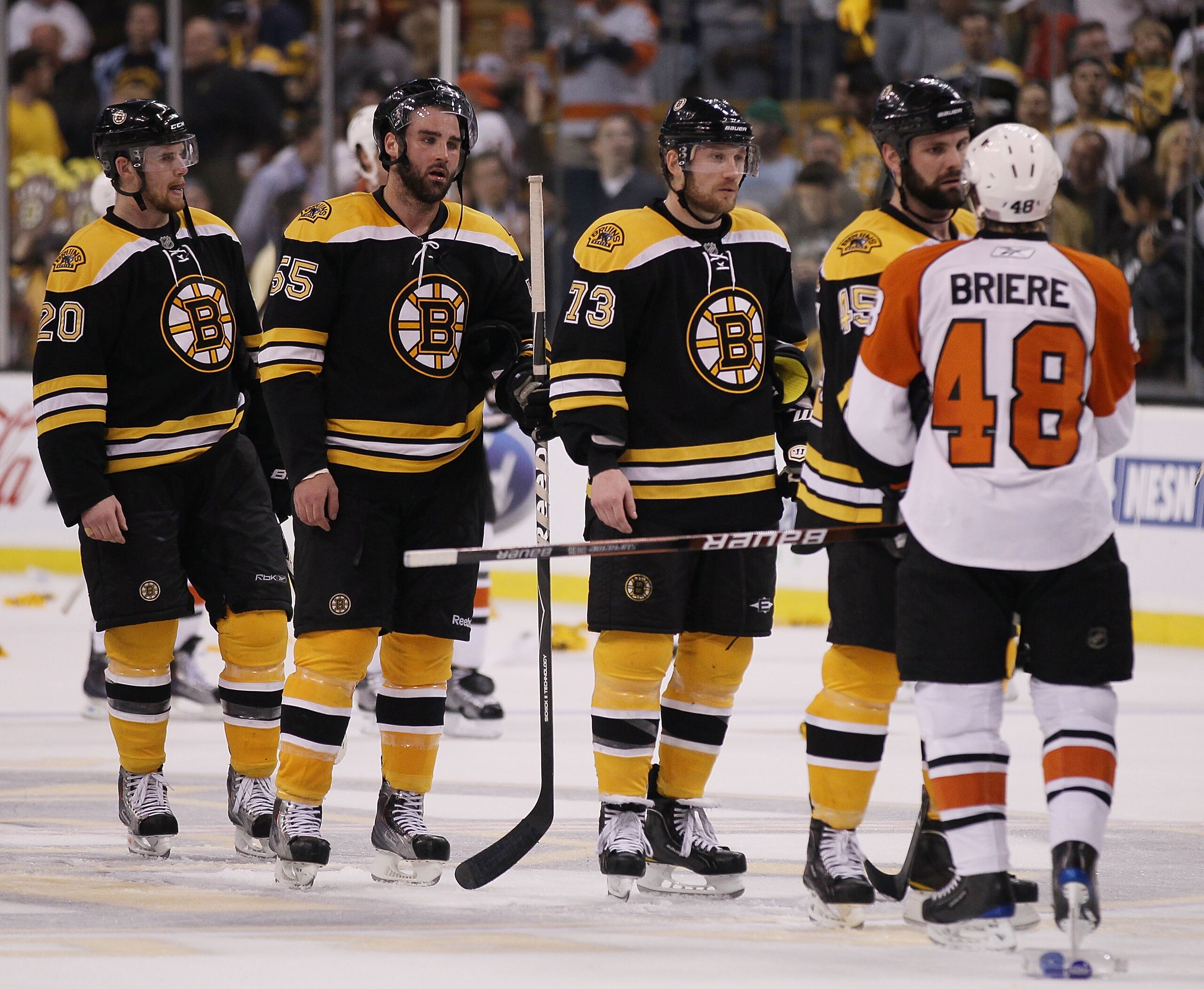 BOSTON - MAY 14:  Mark Stuart #45, Michael Ryder #73, Johnny Boychuk #55 and Daniel Paille #20 of the Boston Bruins congratulate Danny Briere #48 of the Philadelphia Flyers in Game Seven of the Eastern Conference Semifinals during the 2010 NHL Stanley Cup
