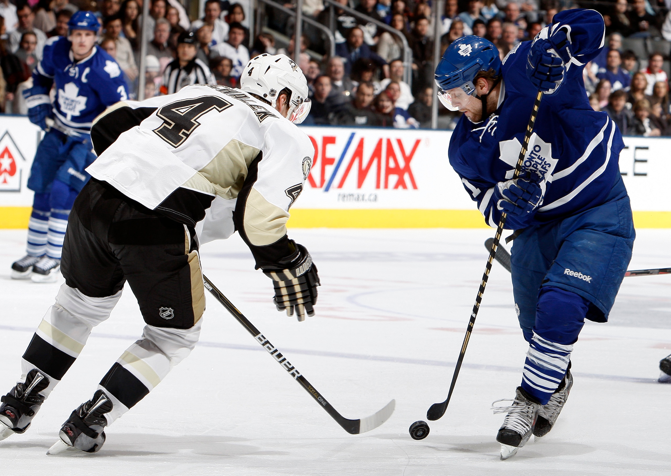 TORONTO, CANADA - FEBRUARY 26: Phil Kessel #81 of the Toronto Maple Leafs gets around Zbynek Michalek #4 of the Pittsburgh Penguins during game action at the Air Canada Centre February 26, 2011 in Toronto, Ontario, Canada. (Photo by Abelimages/Getty Image