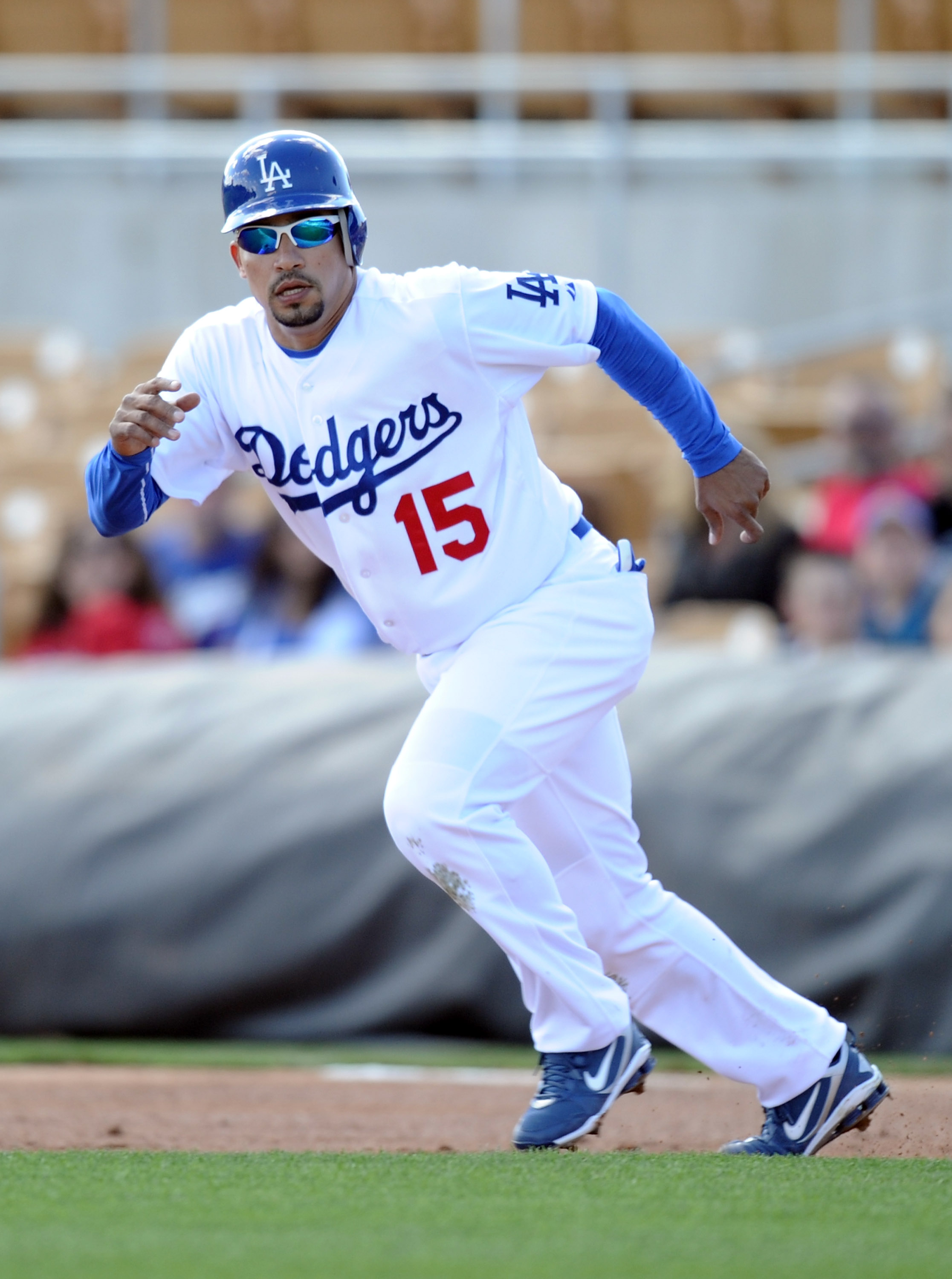 PHOENIX, AZ - FEBRUARY 27:  Rafael Furcal #15 of the Los Angeles Dodgers on base during spring training at Camelback Ranch on February 27, 2011 in Phoenix, Arizona.  (Photo by Harry How/Getty Images)