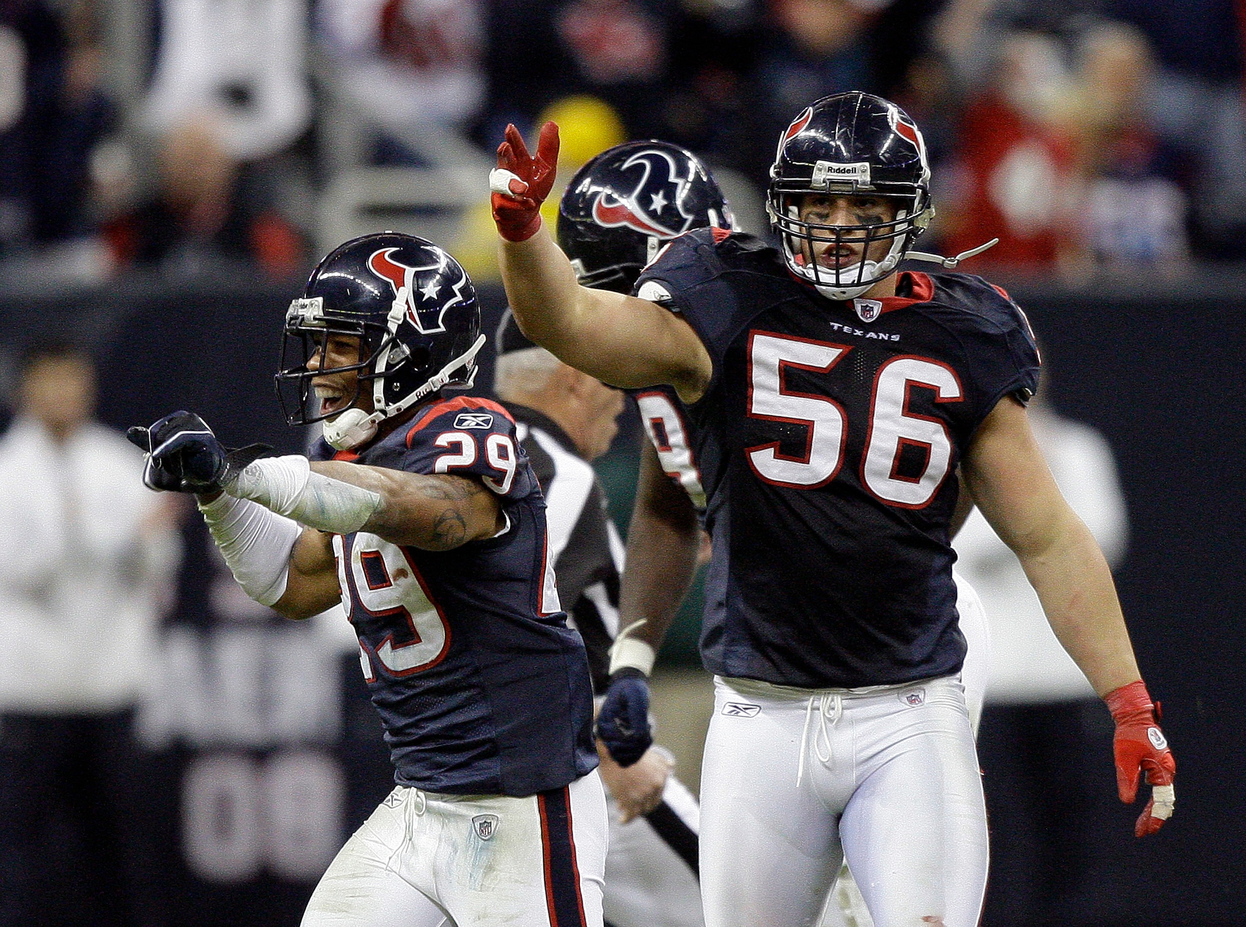 HOUSTON - JANUARY 02:  Glover Quin #29 of the Houston Texans and Brian Cushing #56  celebrate after recovering a fumble late in the fourth quarter against the Jacksonville Jaguars at Reliant Stadium on January 2, 2011 in Houston, Texas.  (Photo by Bob Lev