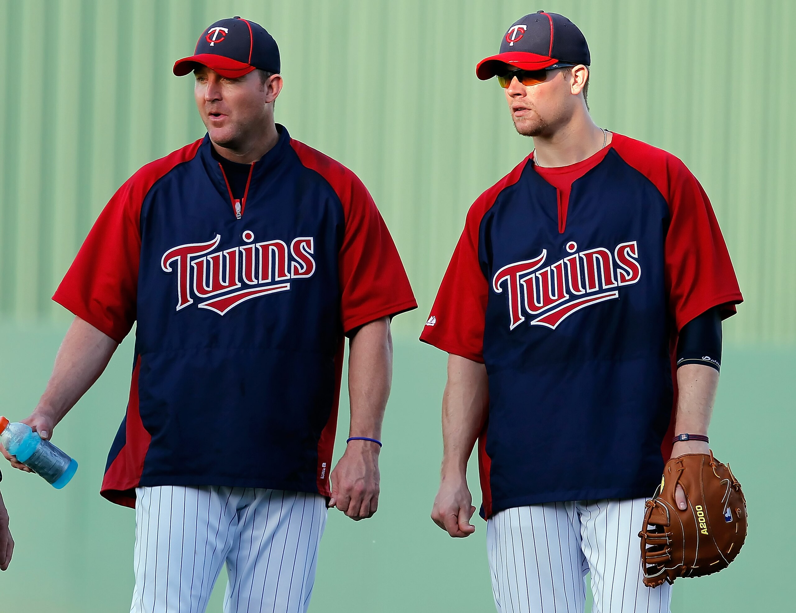 FORT MYERS, FL - FEBRUARY 27: (L - R) Infielder Jim Thome #25 and first baseman Justin Morneau #33 of the Minnesota Twins talk just before the start of the Grapefruit League Spring Training Game against the Boston Red Sox at Hammond Stadium on February 2 FORT MYERS, FL - FEBRUARY 27: (L - R) Infielder Jim Thome #25 and first baseman Justin Morneau #33 of the Minnesota Twins talk just before the start of the Grapefruit League Spring Training Game against the Boston Red Sox at Hammond Stadium on February 2