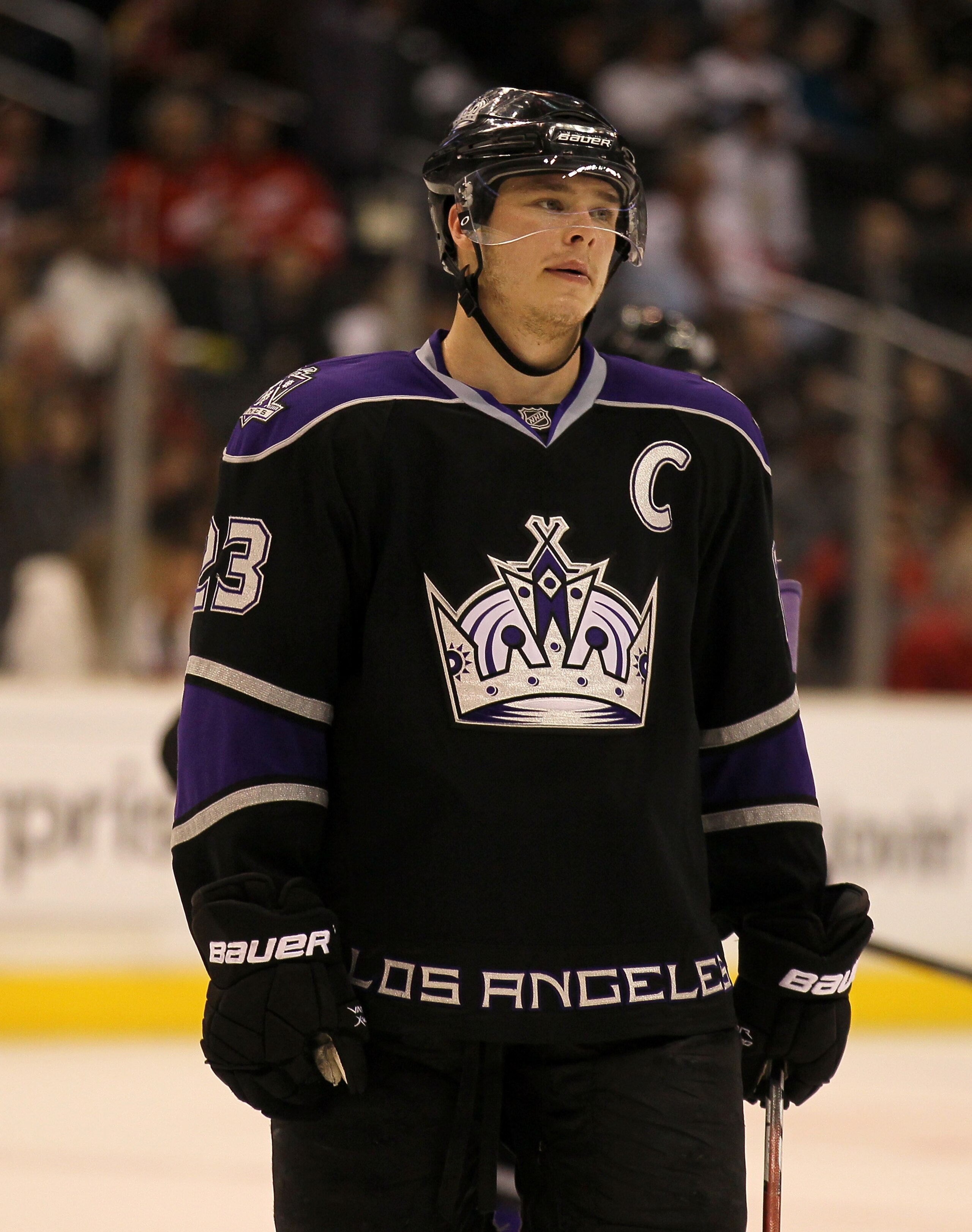 LOS ANGELES, CA - FEBRUARY 28:   Dustin Brown #23 of the Los Angeles Kings stands on the ice in the game with the Detroit Red Wings at Staples Center on February 28, 2011 in Los Angeles, California.   The Red Wings won 7-4.  (Photo by Stephen Dunn/Getty I