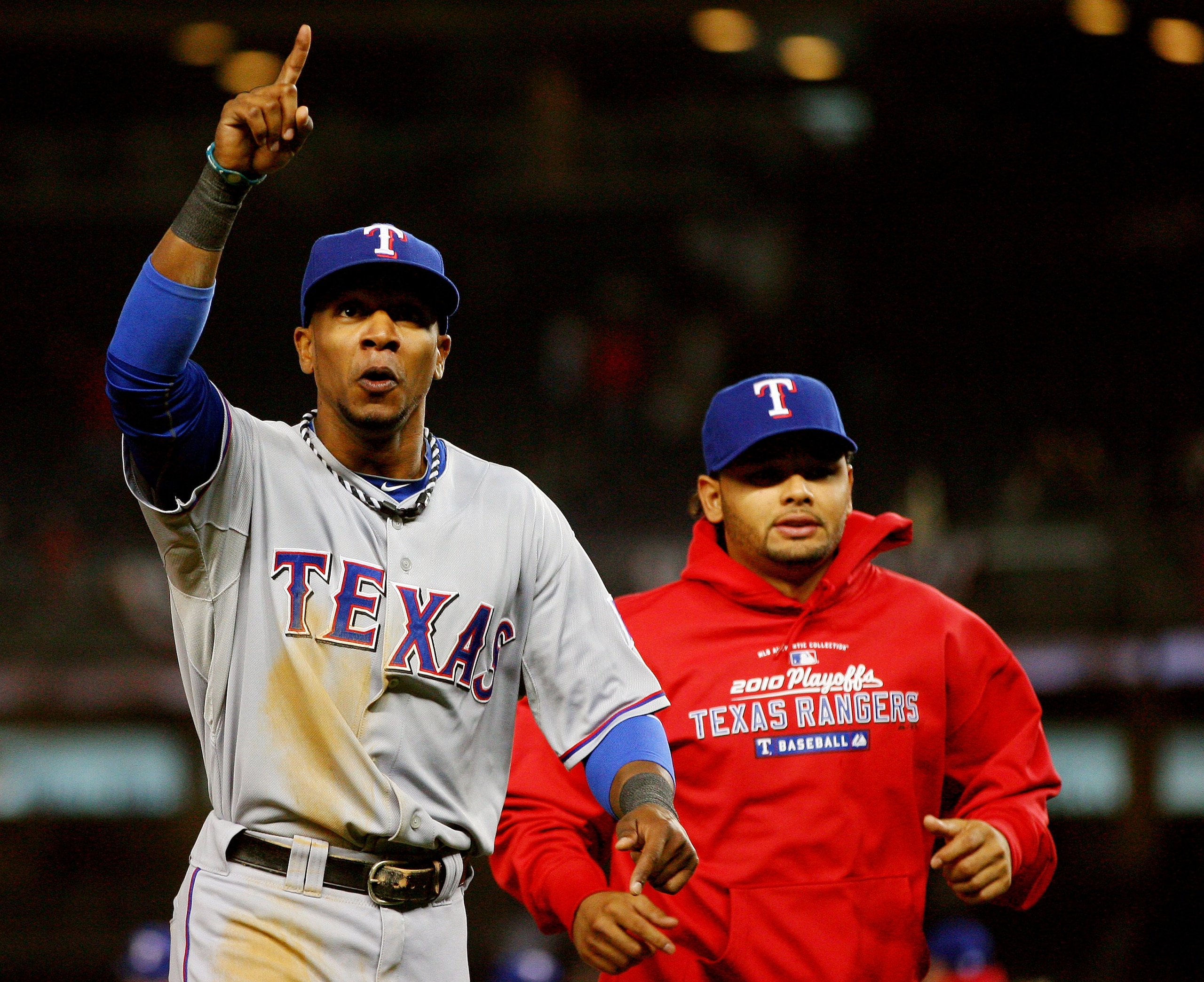 NEW YORK - OCTOBER 19: Julio Borbon #29 of the Texas Rangers celebrates after defeating the New York Yankees by a score of 10-3 in Game Four of the ALCS during the 2010 MLB Playoffs at Yankee Stadium on October 19, 2010 in the Bronx borough of New York C NEW YORK - OCTOBER 19: Julio Borbon #29 of the Texas Rangers celebrates after defeating the New York Yankees by a score of 10-3 in Game Four of the ALCS during the 2010 MLB Playoffs at Yankee Stadium on October 19, 2010 in the Bronx borough of New York C