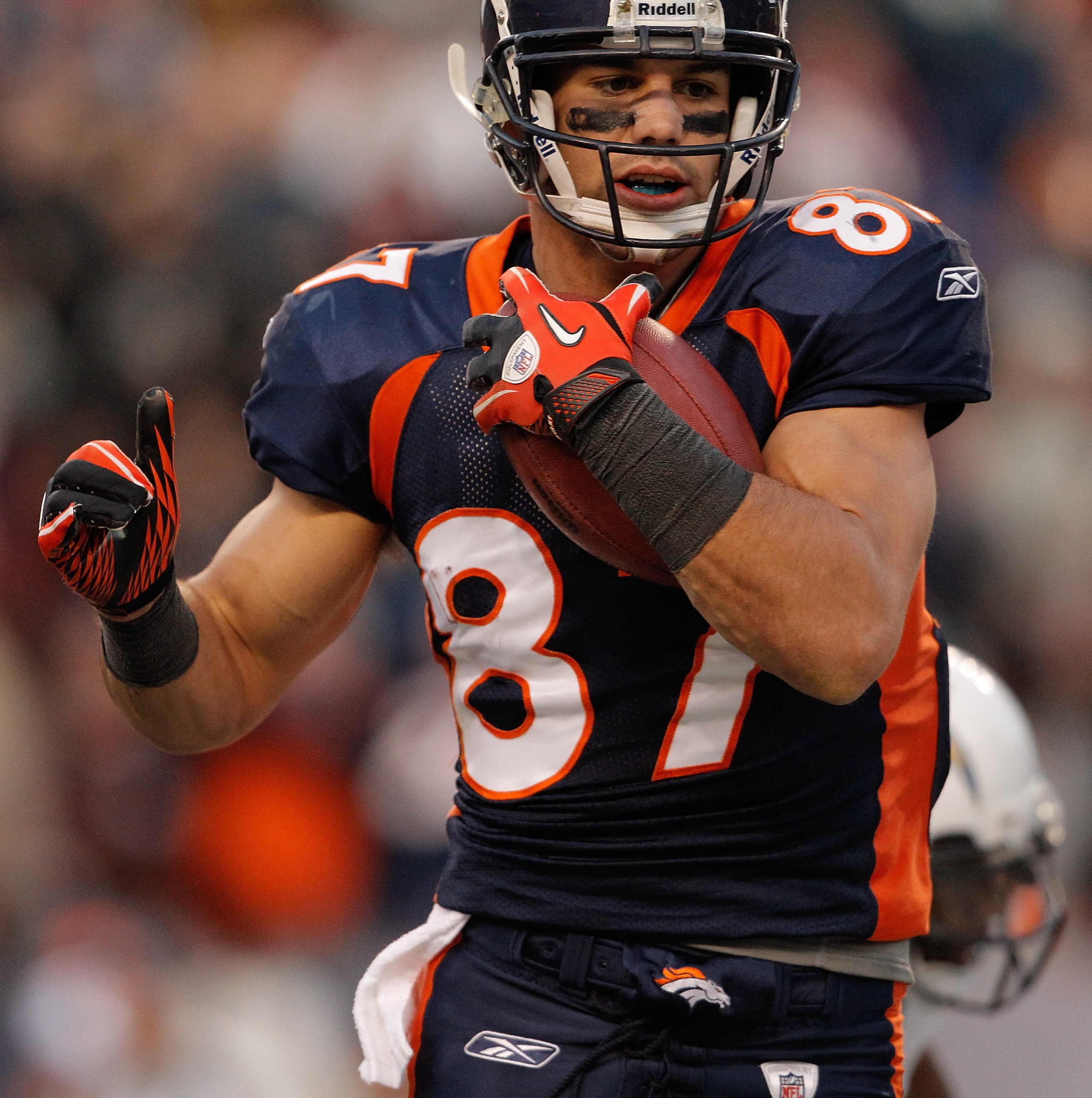 DENVER, CO - JANUARY 2:  Wide receiver Eric Decker #87 of the Denver Broncos scores a touchdown off a pass from Tim Tebow during the third quarter against the San Diego Chargers at INVESCO Field at Mile High on January 2, 2011 in Denver, Colorado. (Photo